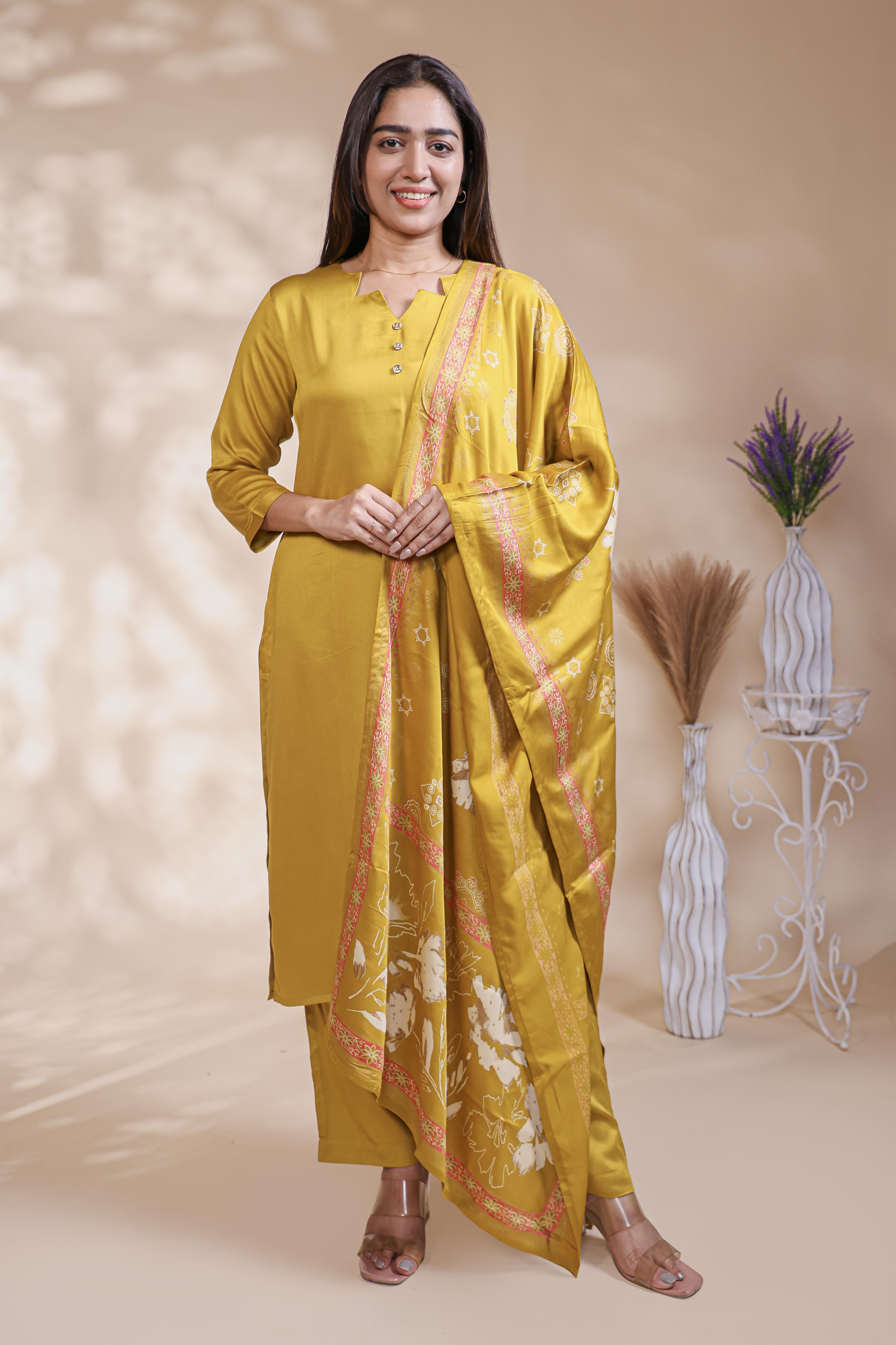 Mustard plain salwar suit with front star cut neck, 3/4 sleeves and matching bottom