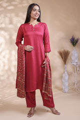 Red plain salwar suit with front star cut neck, 3/4 sleeves and matching bottom