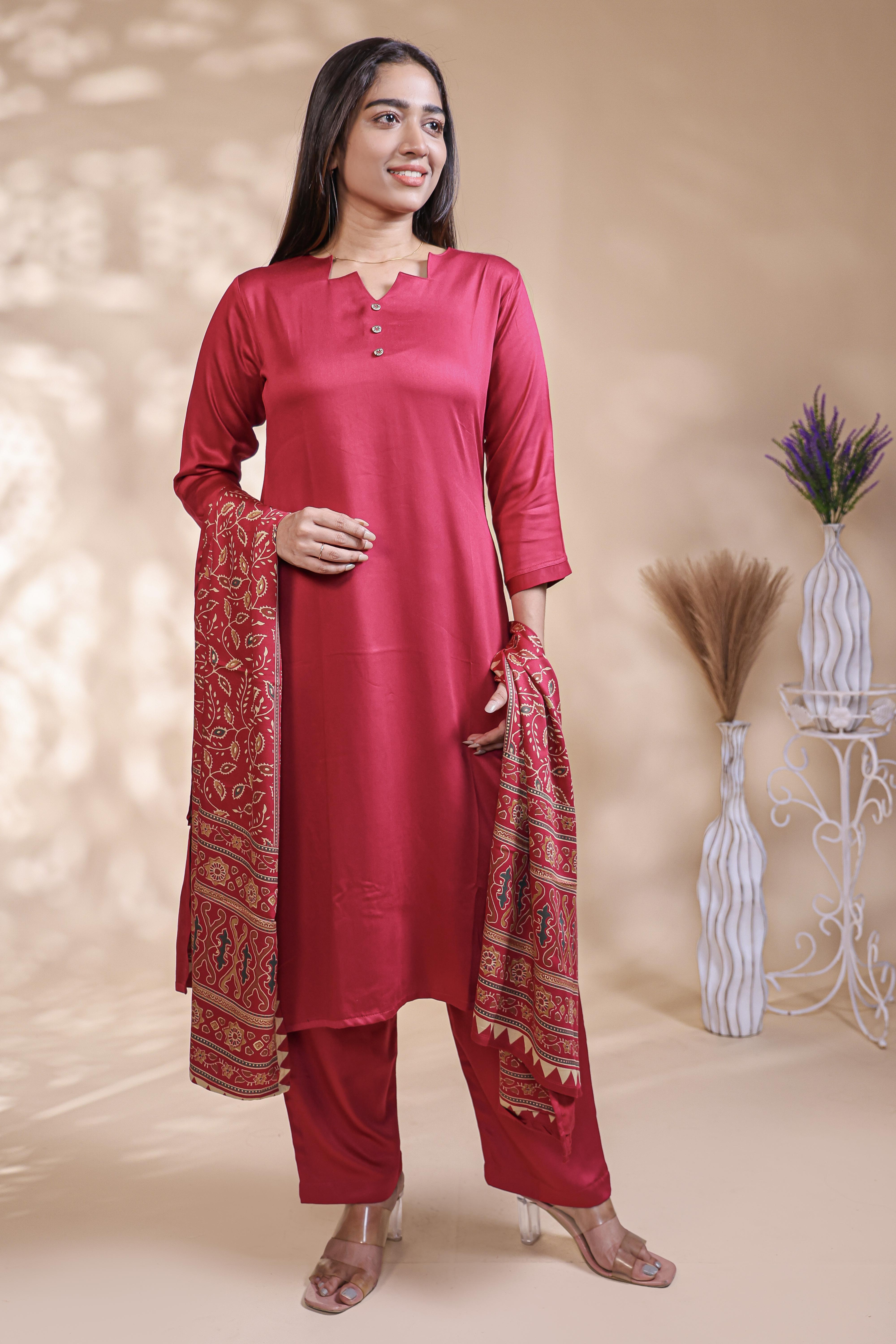 Red plain salwar suit with front star cut neck, 3/4 sleeves and matching bottom