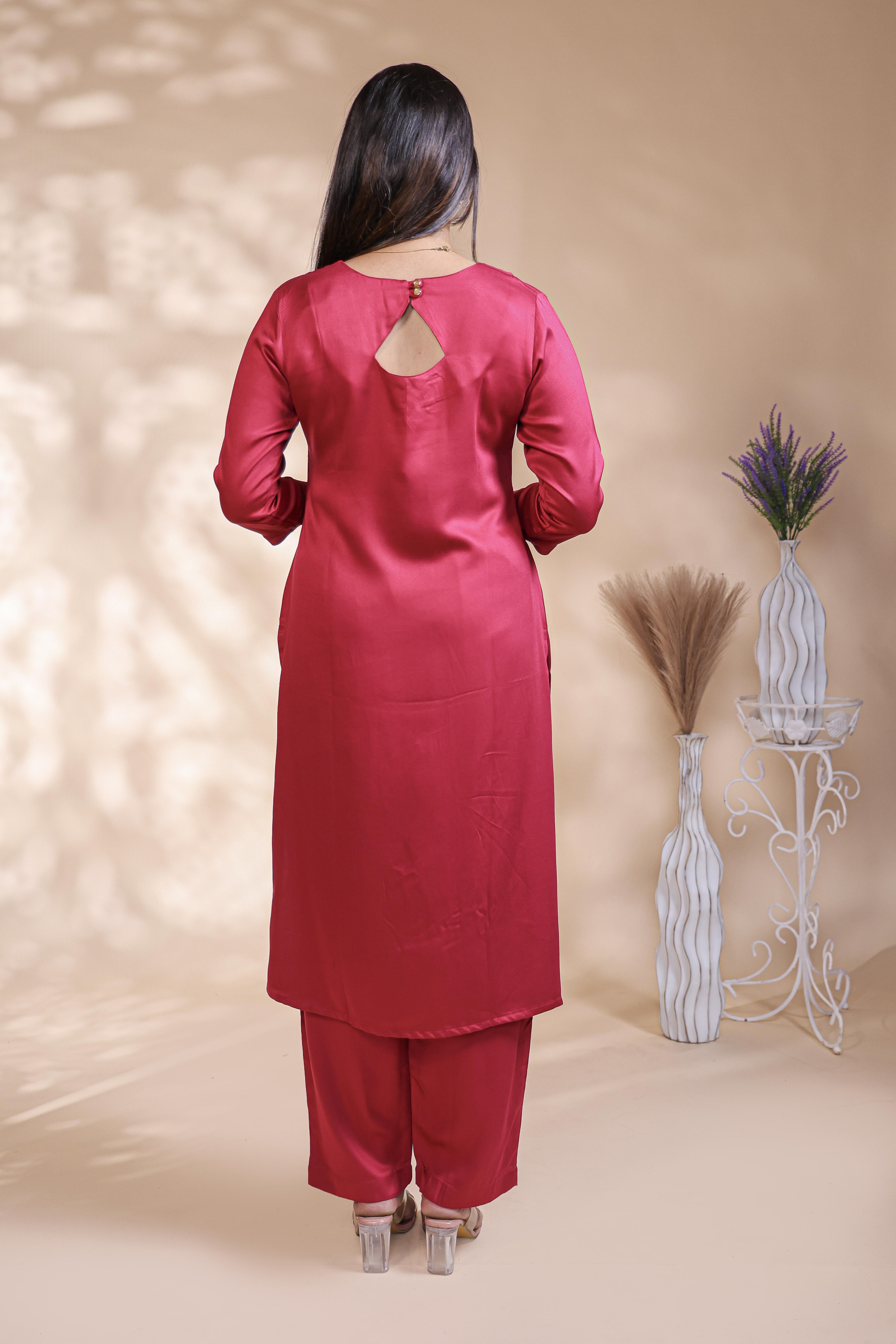 Red plain salwar suit with front star cut neck, 3/4 sleeves and matching bottom
