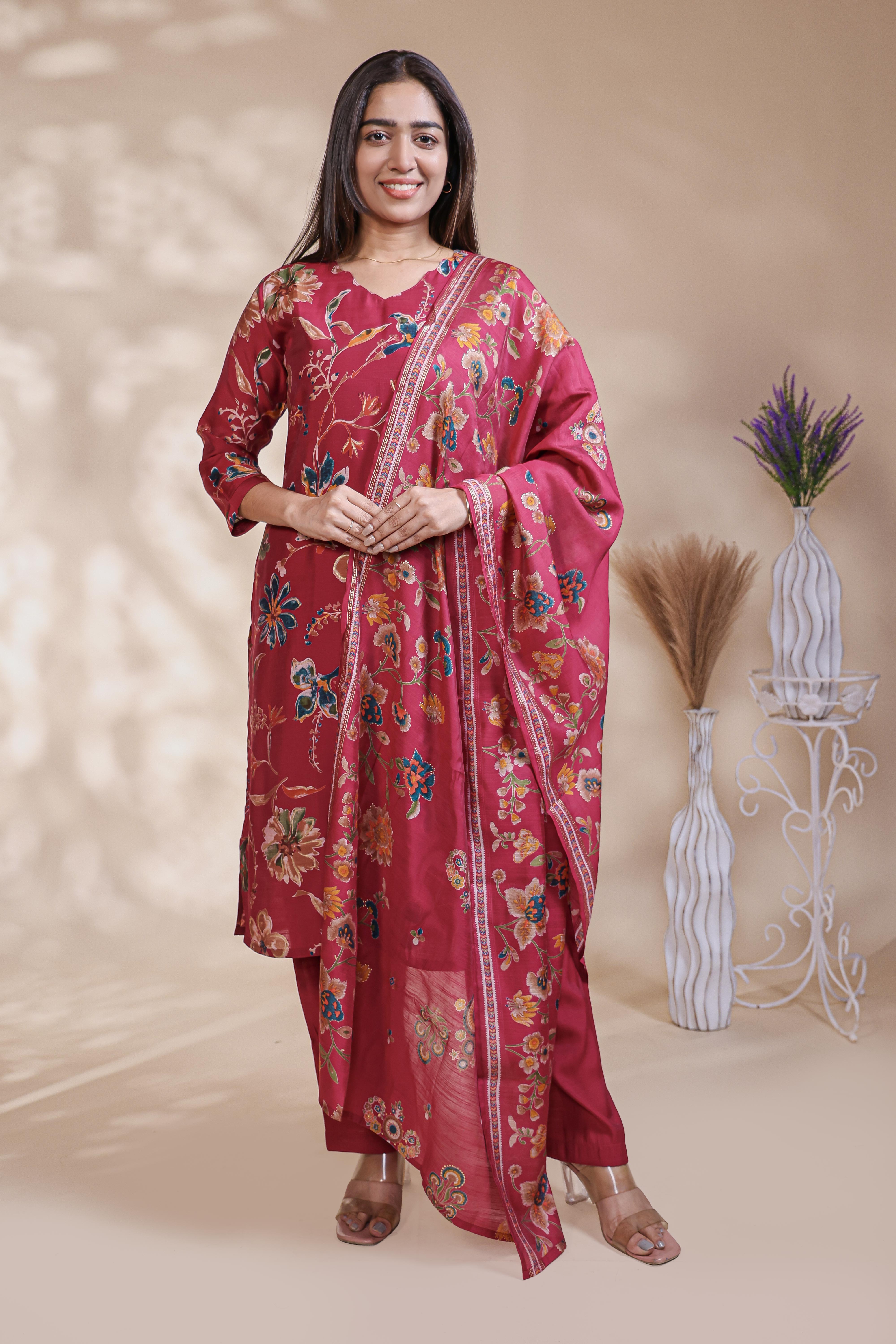 Red floral design salwar suit with front V-neck, 3/4 sleeves and matching bottom