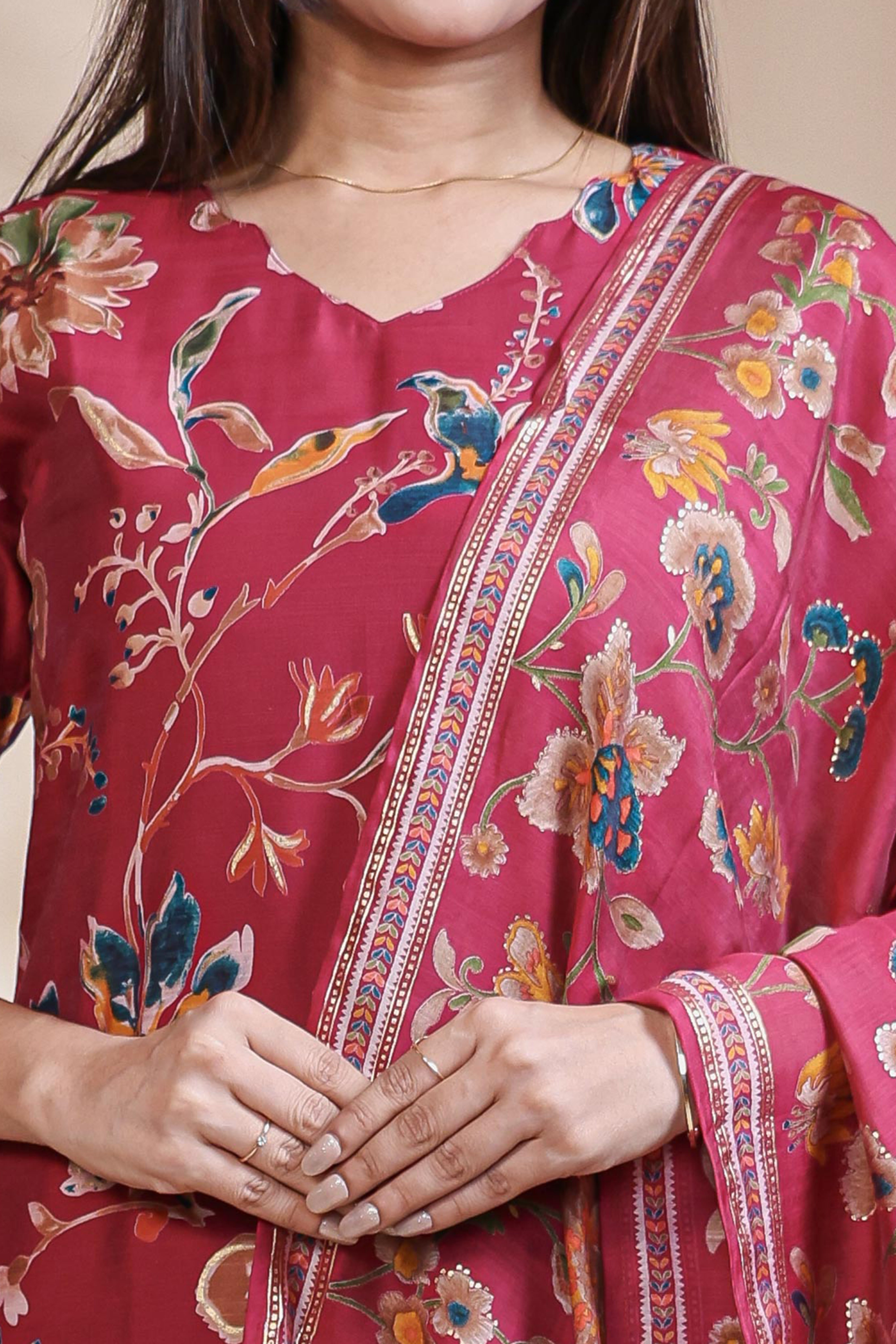 Red floral design salwar suit with front V-neck, 3/4 sleeves and matching bottom