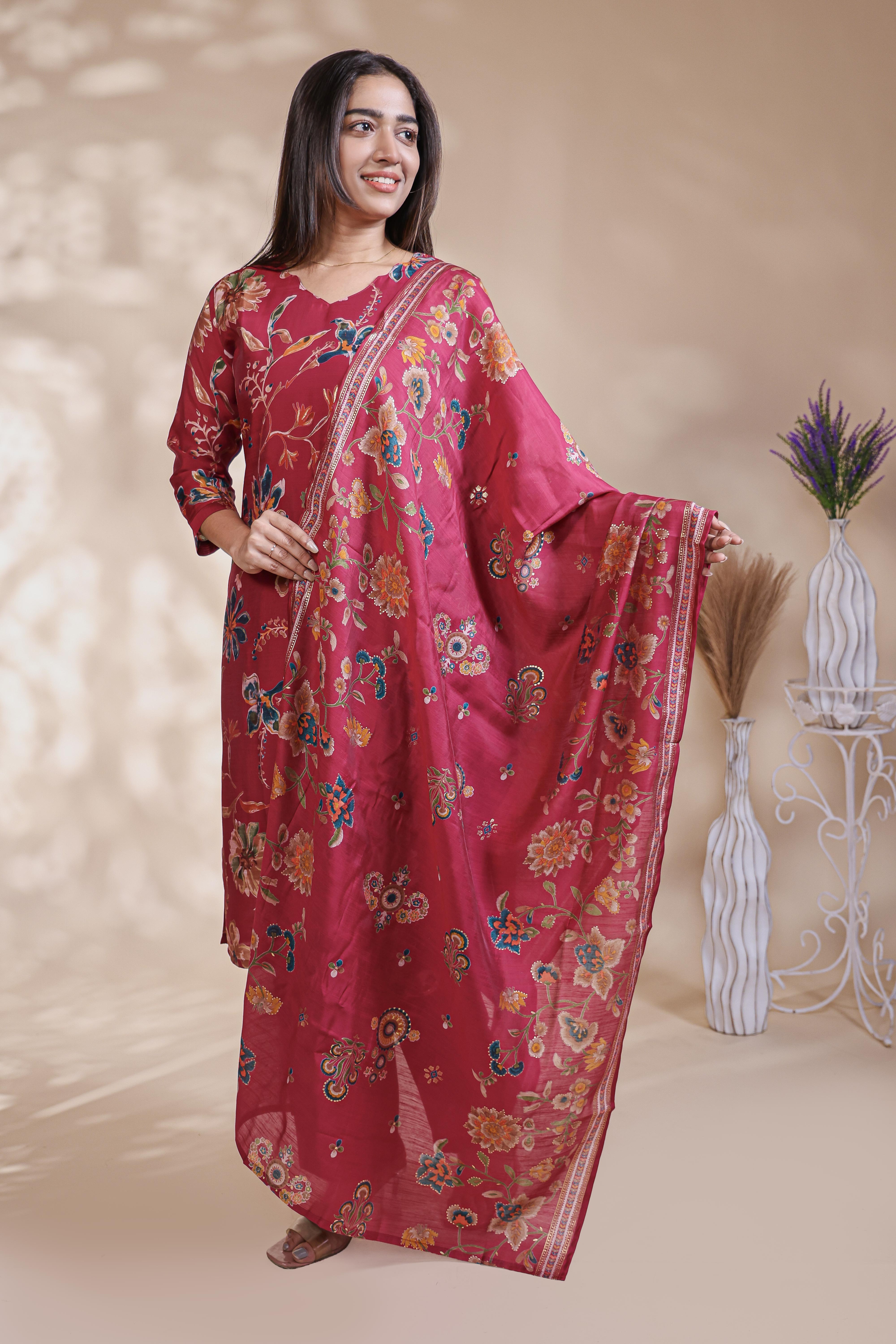 Red floral design salwar suit with front V-neck, 3/4 sleeves and matching bottom