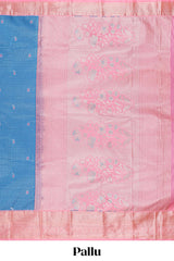 Blue checked zari butta semi soft silk saree with contrast border and floral design pallu