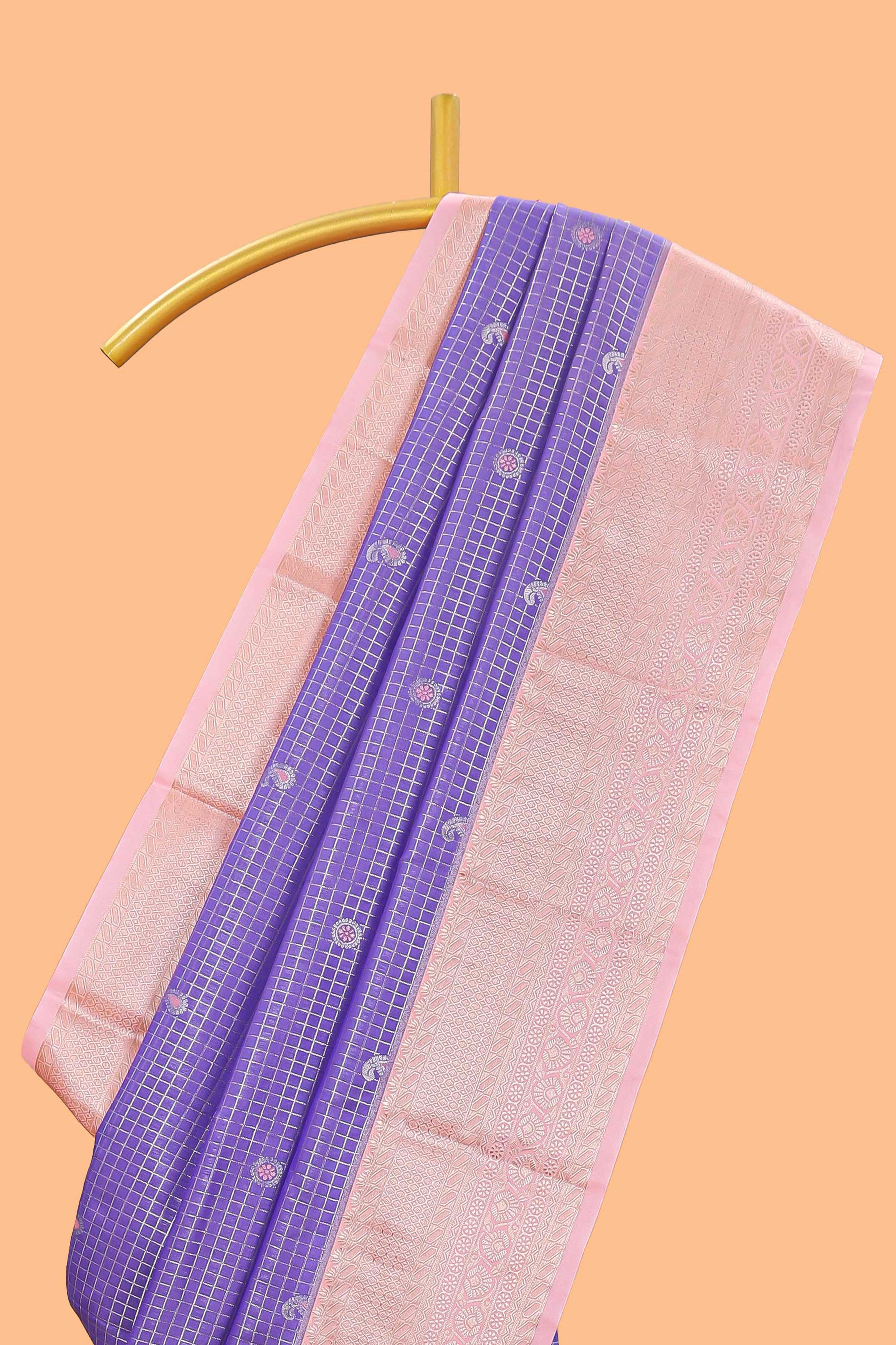 Lavender checked zari motifs semi soft silk saree with contrast border and floral design pallu