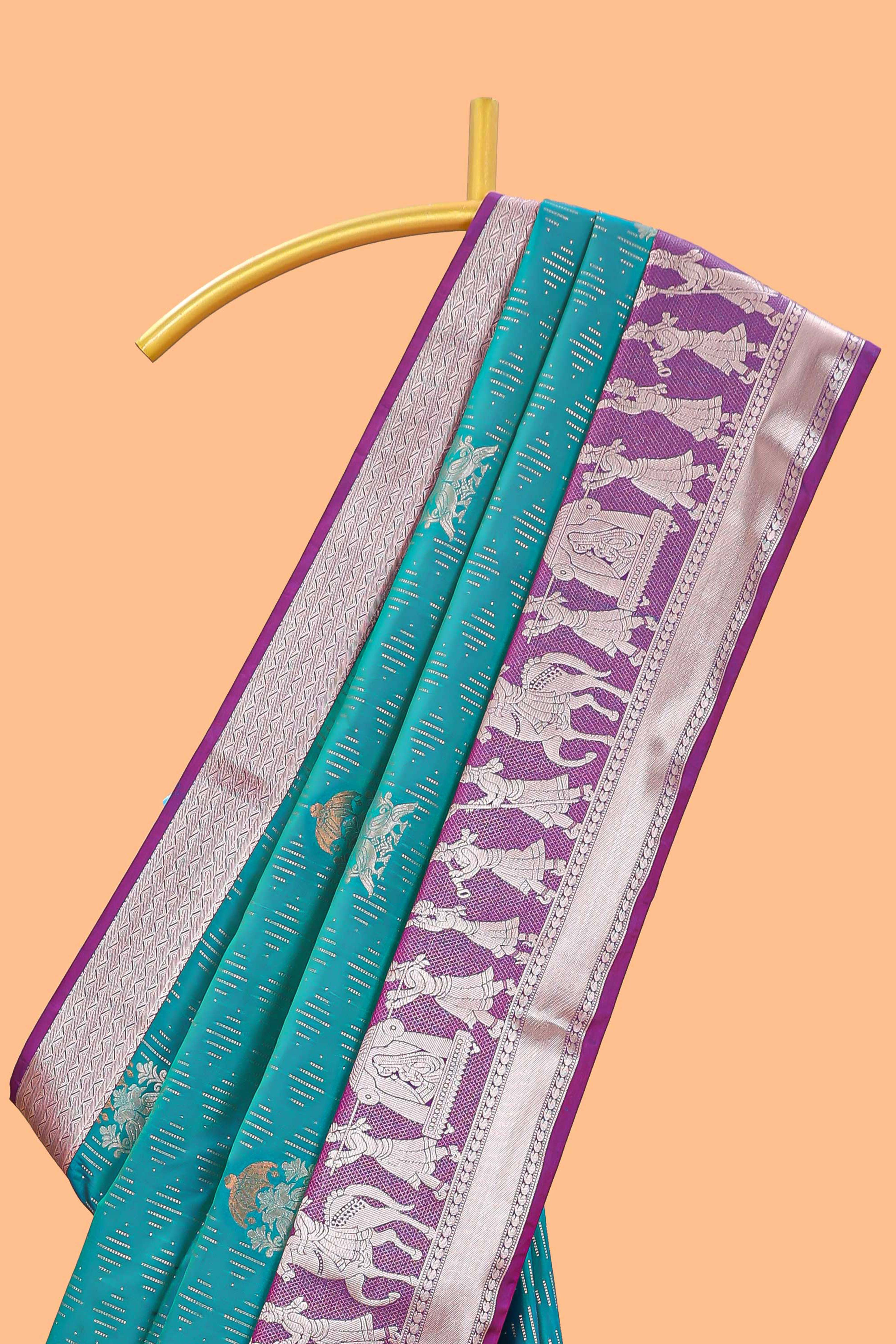 Green geometric design birds zari motifssemi soft silk saree with contrast border and floral design pallu