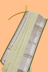 Green checked zari buttas semi soft silk saree with contrast zari border and floral design pallu