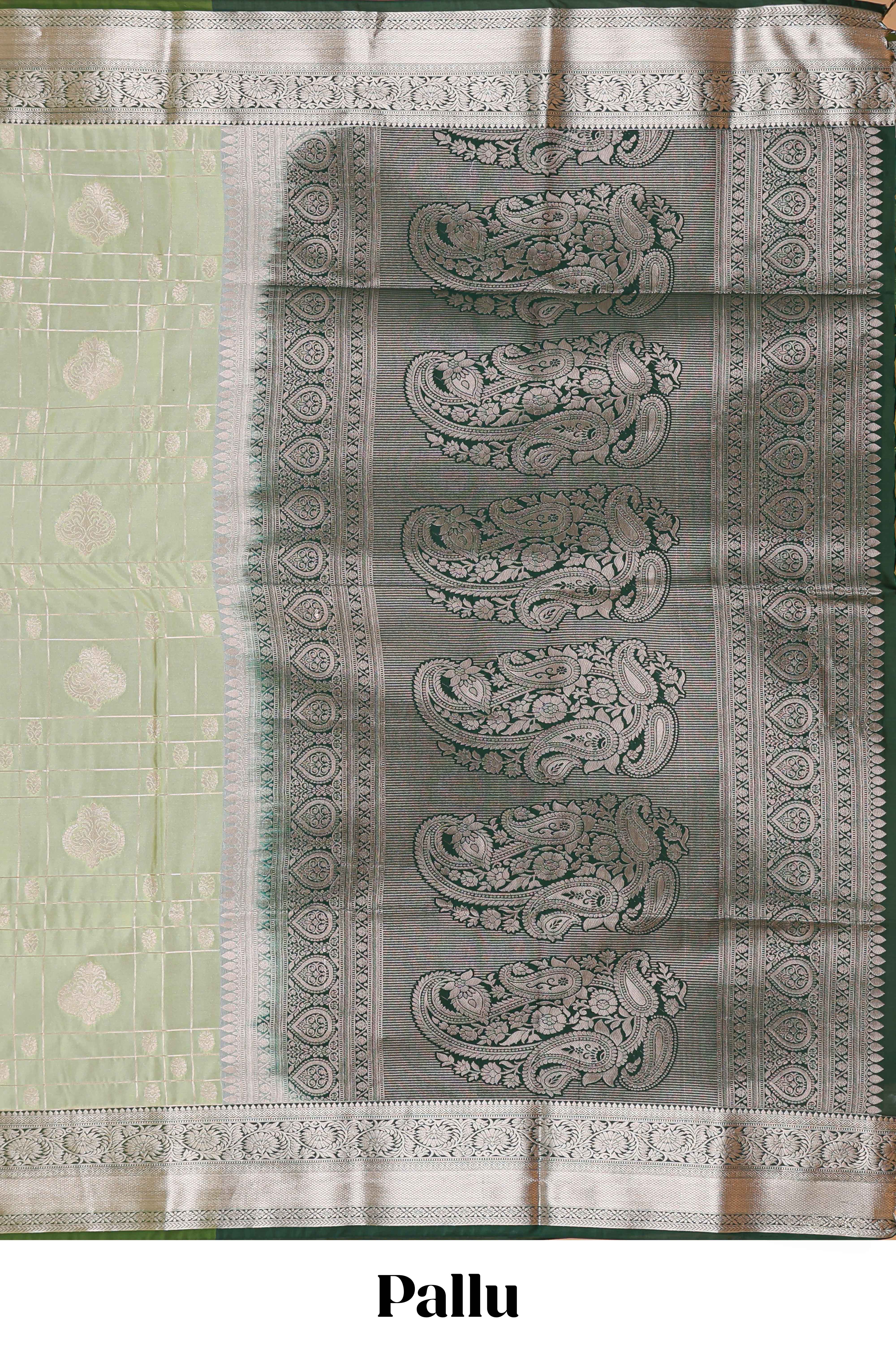Green checked zari buttas semi soft silk saree with contrast zari border and floral design pallu
