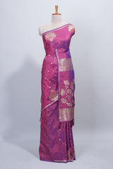 Magenta & purple dual tone floral zari motifs design semi soft silk saree with self border and matching blouse