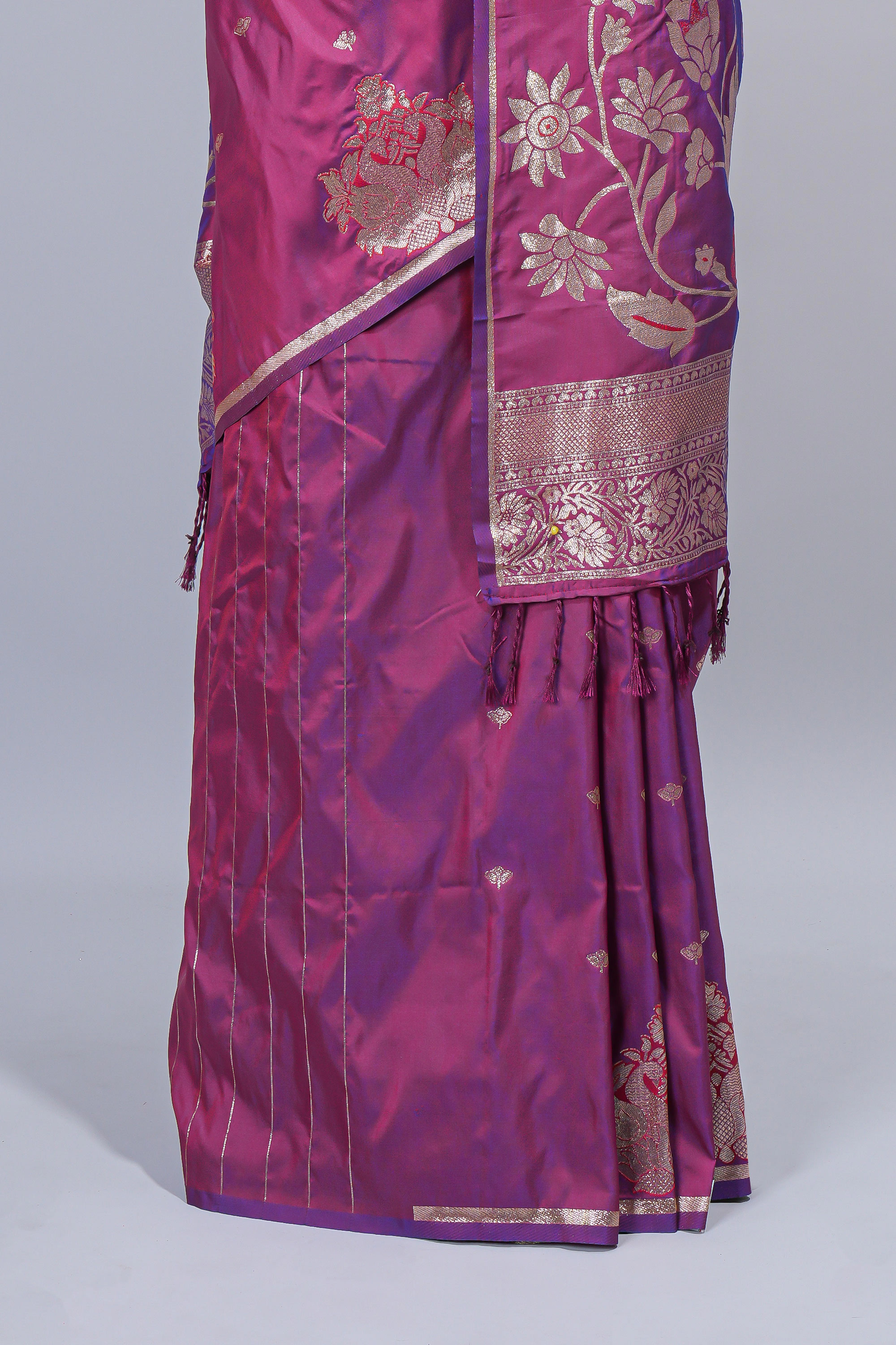 Magenta & purple dual tone floral zari motifs design semi soft silk saree with self border and matching blouse