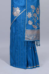 Blue floral zari motifs design semi soft silk saree with self border and matching blouse