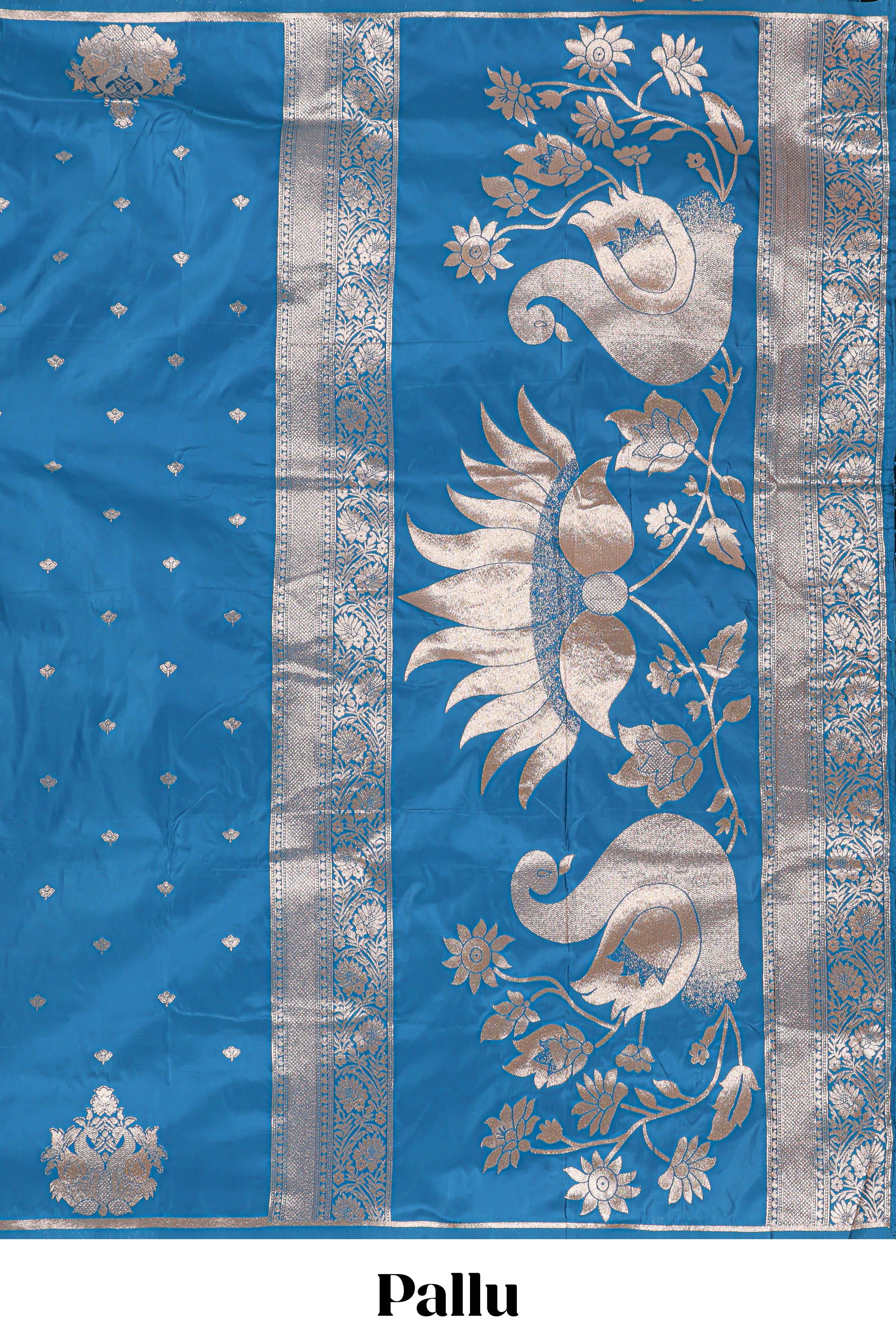 Blue colour Semi soft silk withgold zari floral motifs border with peacock motifs and matching blouse