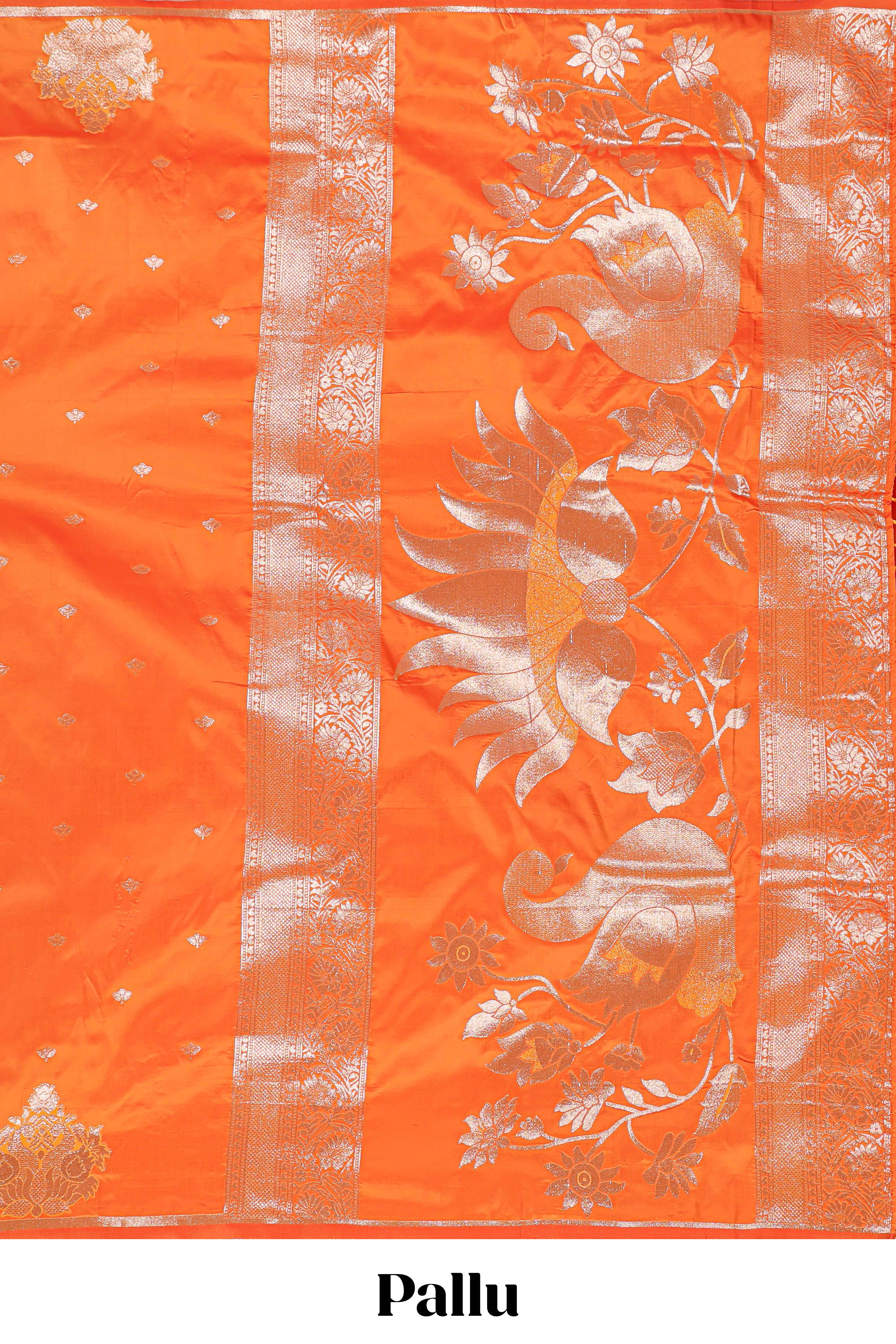 Orange colour Semi soft silk withgold zari floral motifs border with peacock motifs and matching blouse