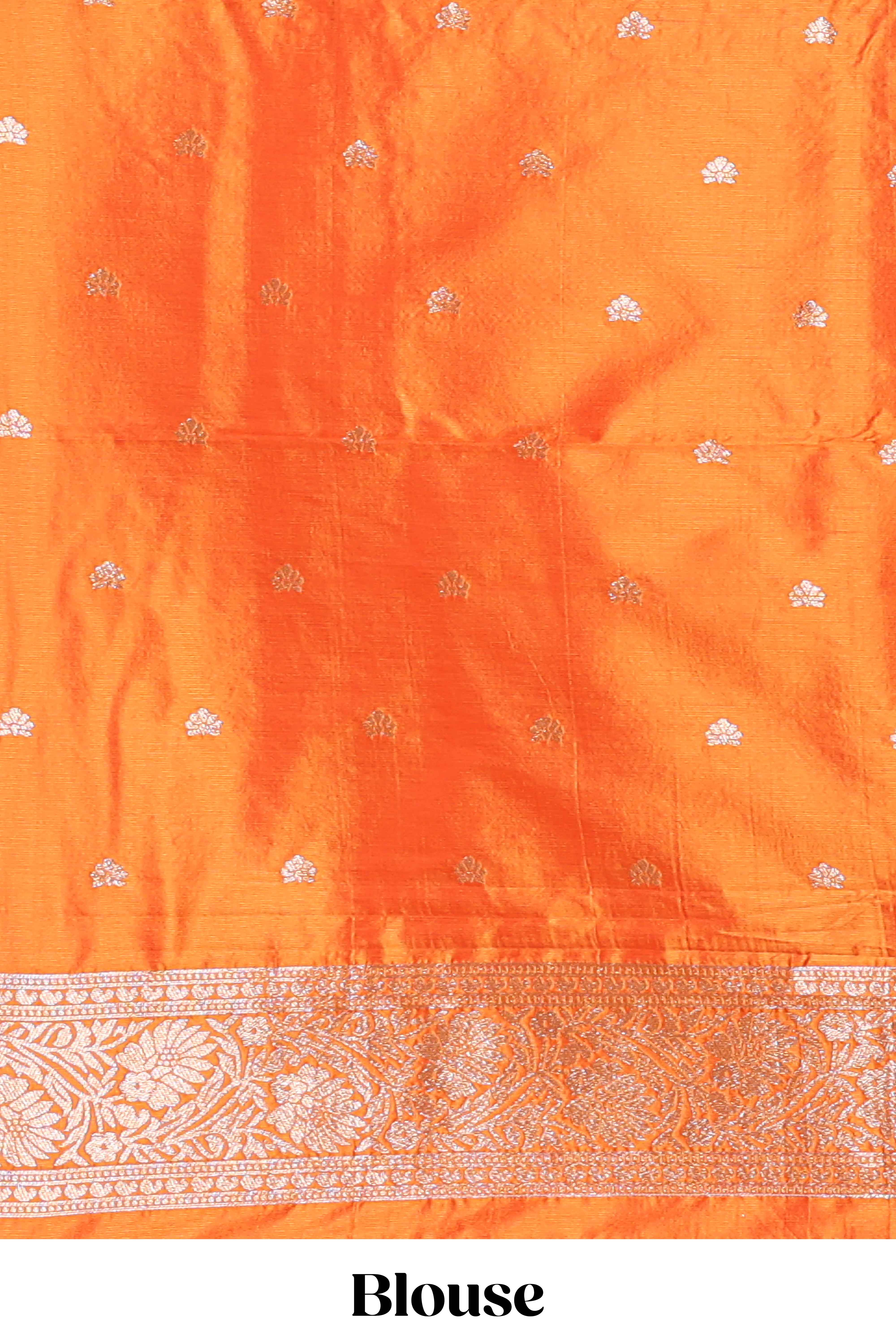 Orange colour Semi soft silk withgold zari floral motifs border with peacock motifs and matching blouse