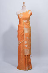 Light orange floral zari motifs design semi soft silk saree with self border and matching blouse