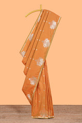 Rust Orange colour Semi soft silk withgold zari floral motifs border with peacock motifs and matching blouse