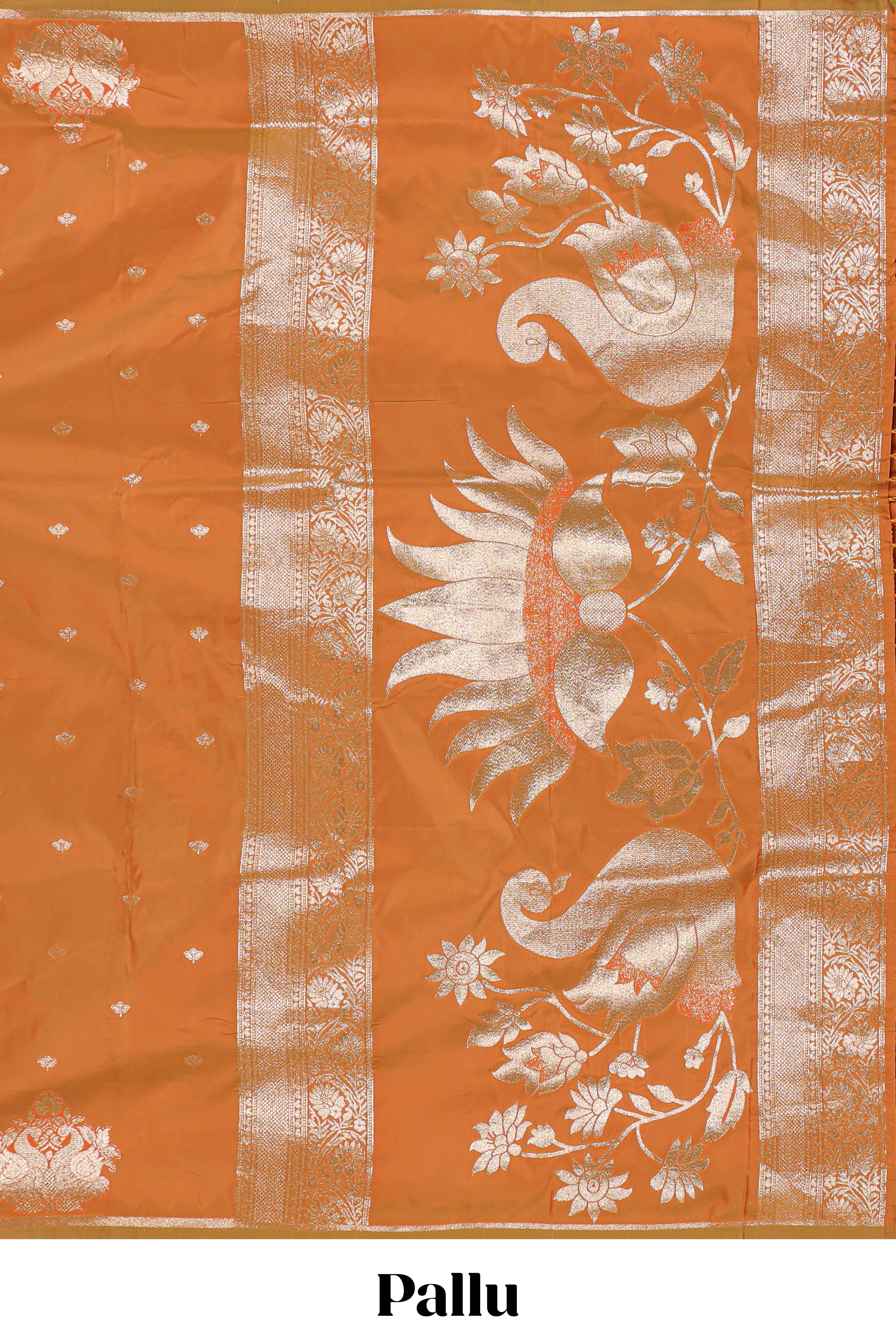 Rust Orange colour Semi soft silk withgold zari floral motifs border with peacock motifs and matching blouse