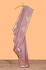 Peach colour Semi soft silk withgold zari floral motifs border with peacock motifs and matching blouse