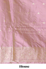 Peach colour Semi soft silk withgold zari floral motifs border with peacock motifs and matching blouse