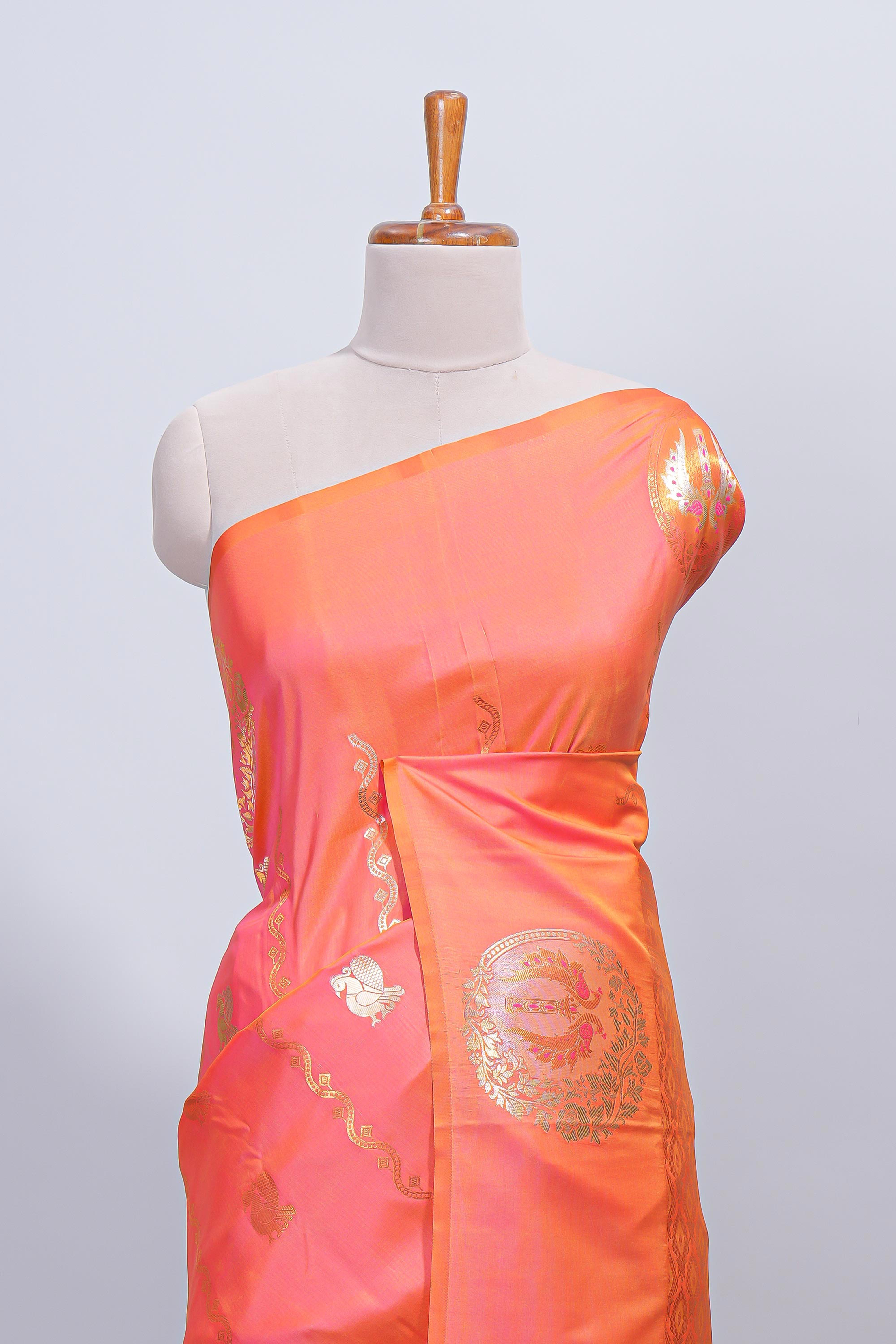 Orange floral zari motifs design semi soft silk saree with self border and matching blouse