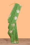 Green colour Semi soft silk withgold zari floral motifs border with peacock motifs and matching blouse