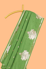 Green colour Semi soft silk withgold zari floral motifs border with peacock motifs and matching blouse