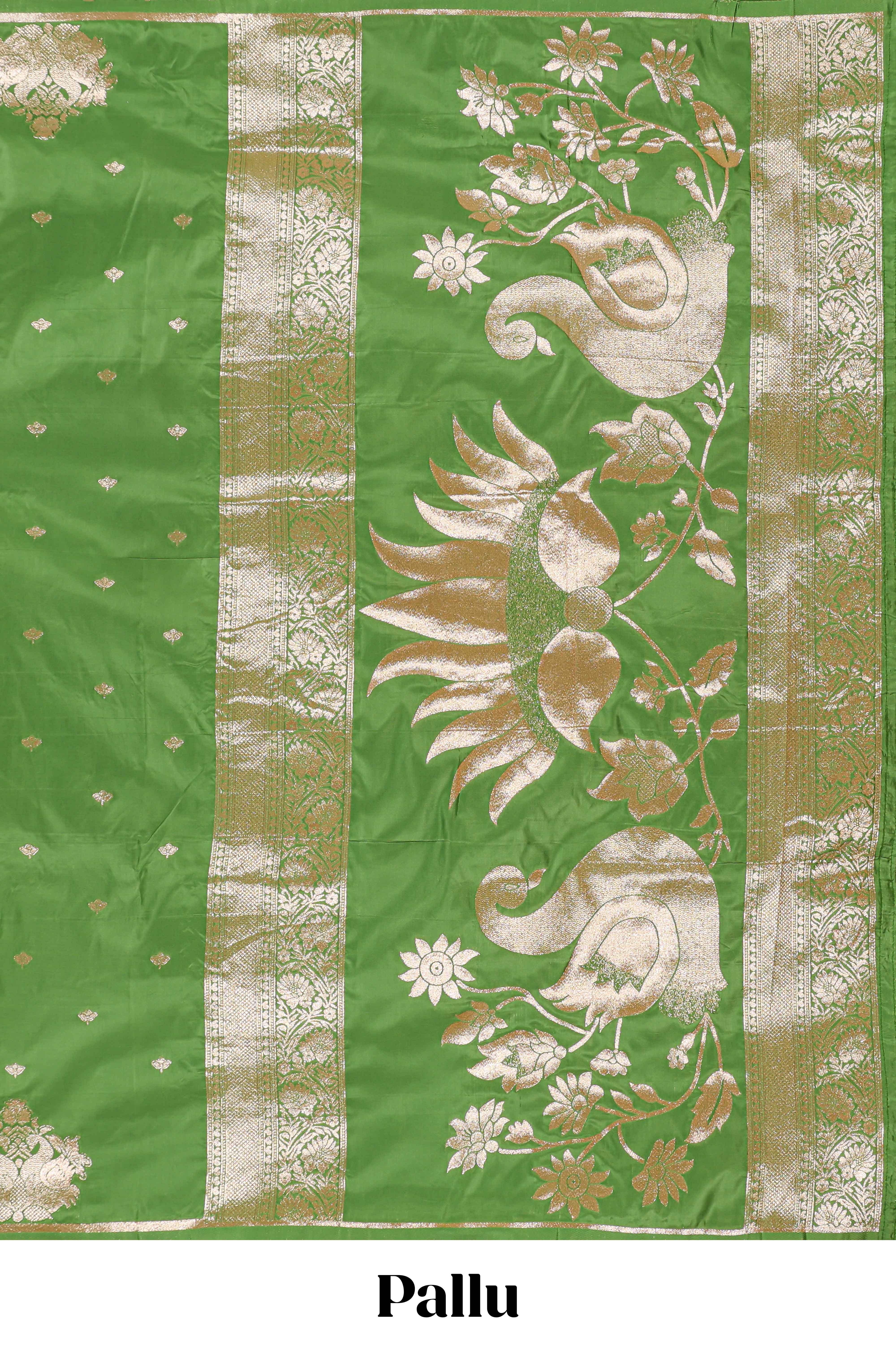 Green colour Semi soft silk withgold zari floral motifs border with peacock motifs and matching blouse