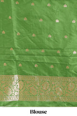 Green colour Semi soft silk withgold zari floral motifs border with peacock motifs and matching blouse