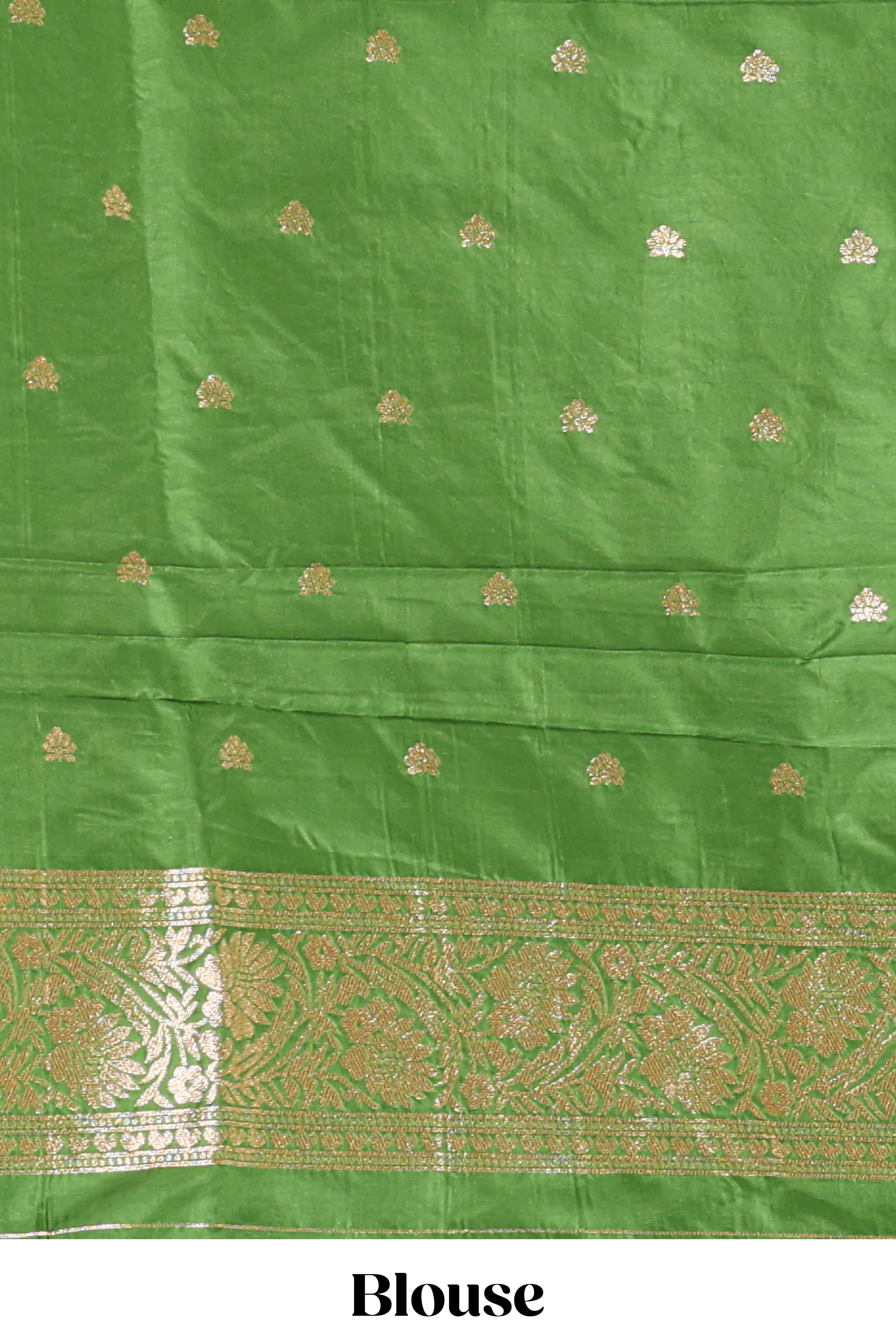 Green colour Semi soft silk withgold zari floral motifs border with peacock motifs and matching blouse