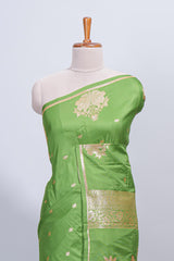 Green floral zari motifs design semi soft silk saree with self border and matching blouse