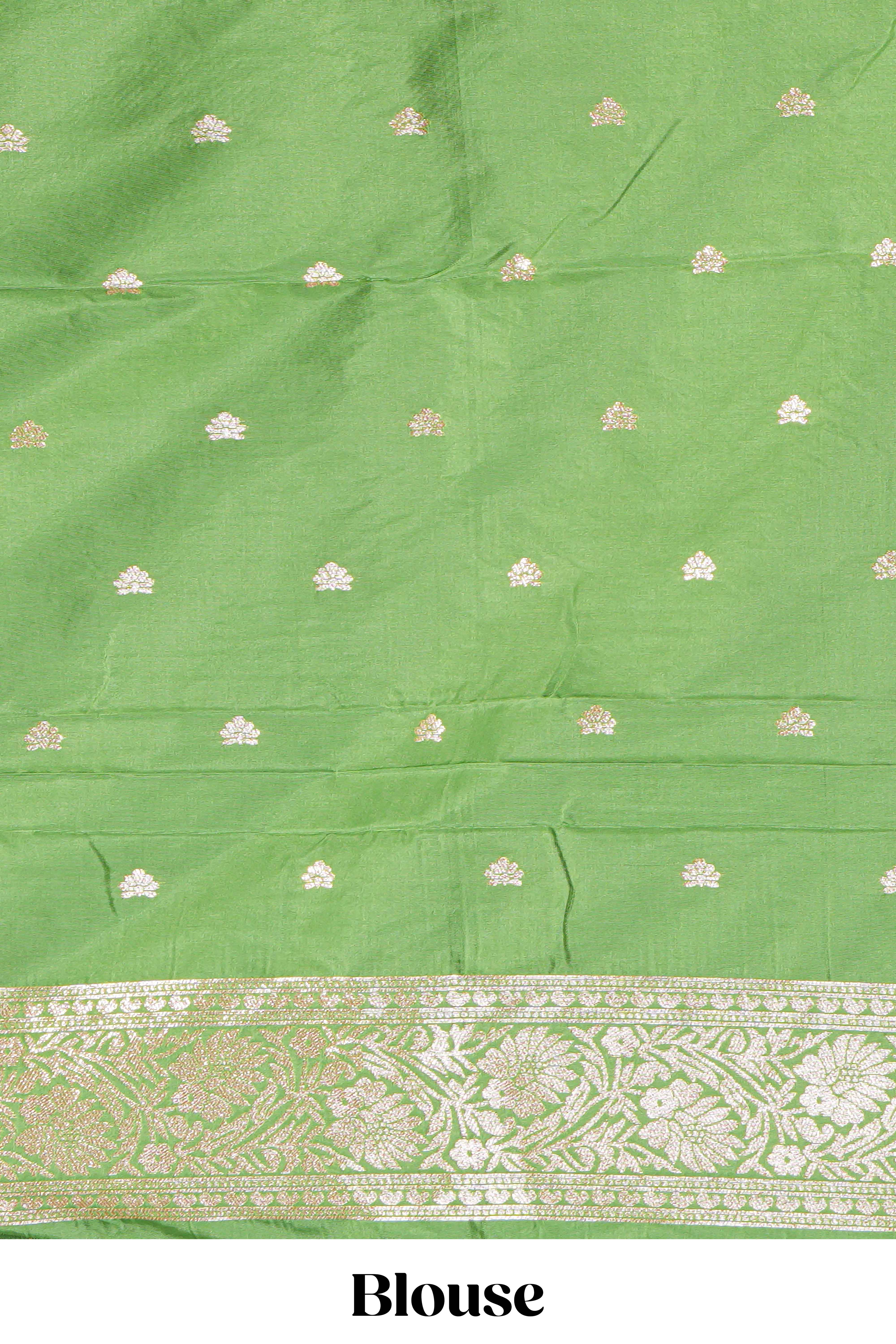 Green floral zari motifs design semi soft silk saree with self border and matching blouse
