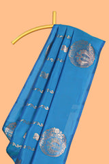 Blue colour Semi soft silk withgold zari floral motifs border with Vaira oosi Design and matching blouse