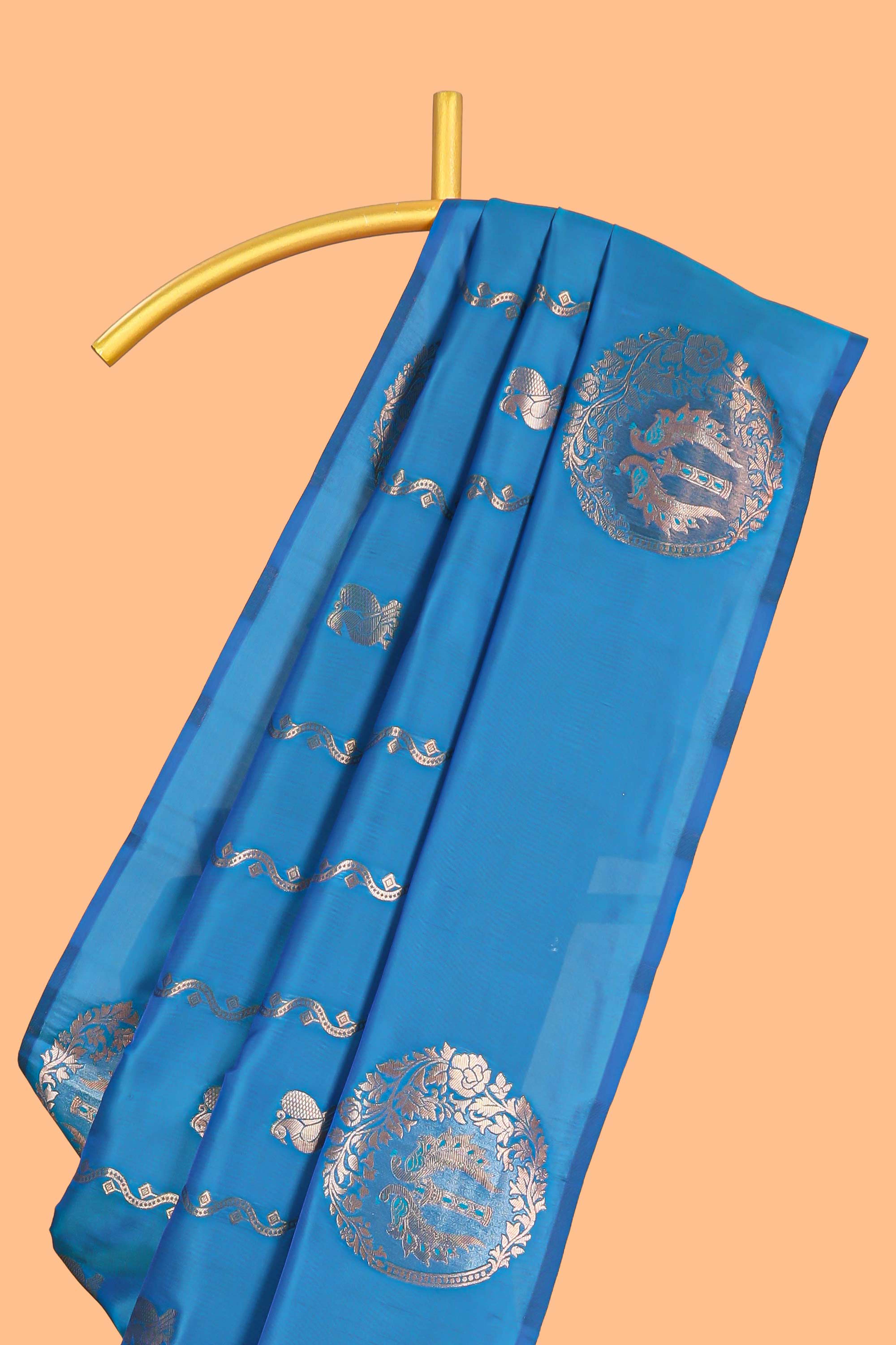 Blue colour Semi soft silk withgold zari floral motifs border with Vaira oosi Design and matching blouse