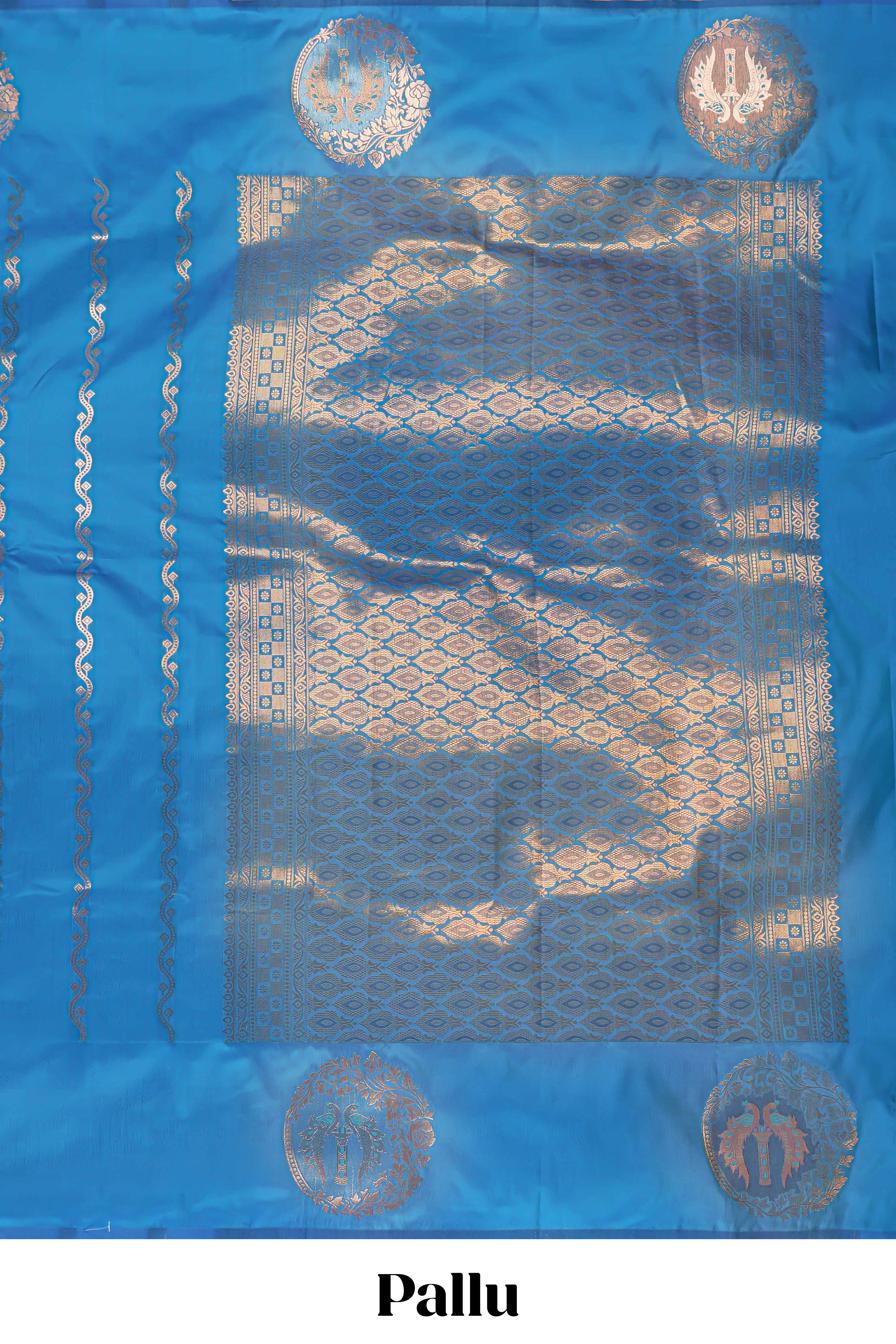 Blue colour Semi soft silk withgold zari floral motifs border with Vaira oosi Design and matching blouse