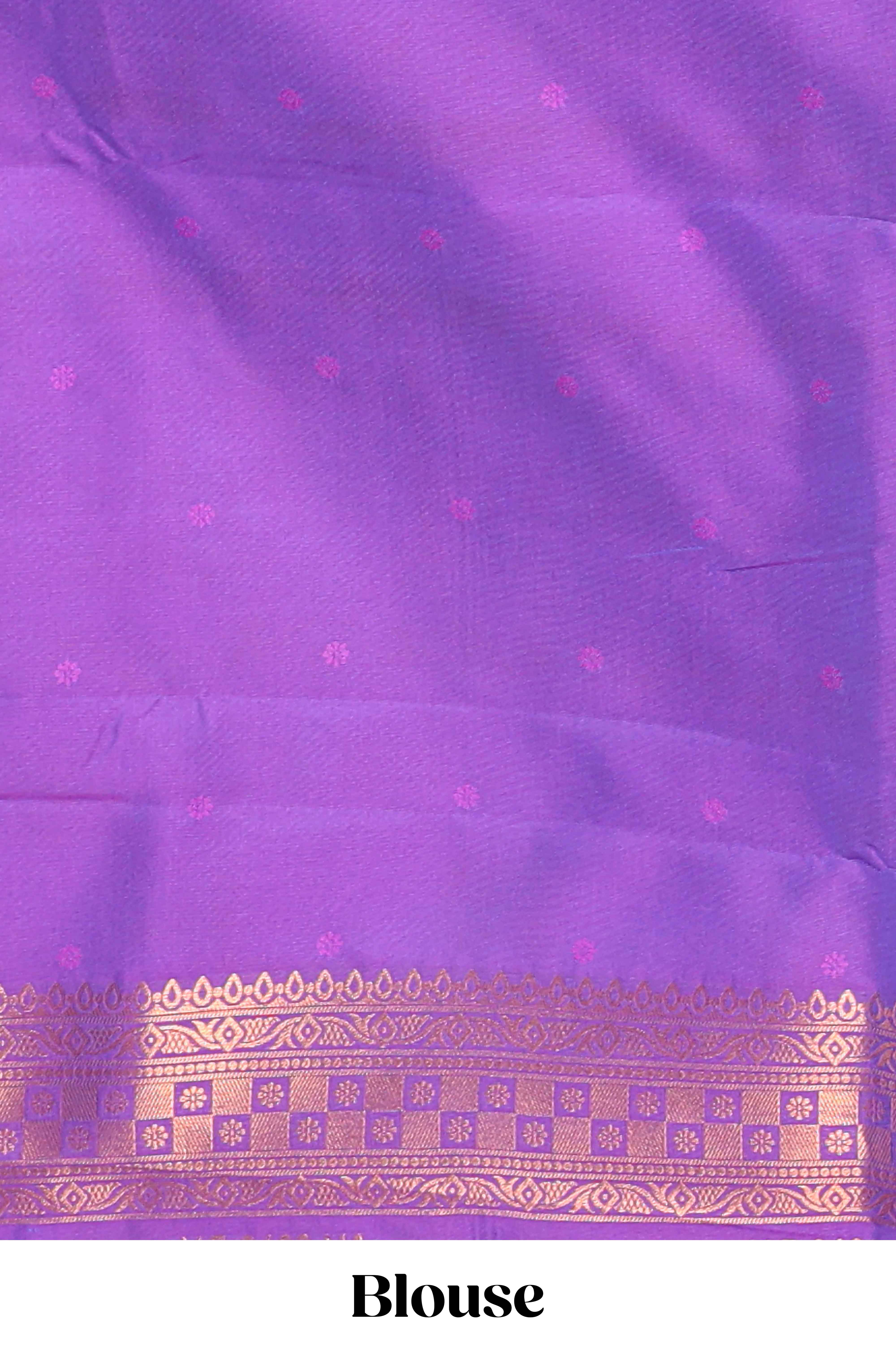 Violet colour Semi soft silk withgold zari floral motifs border with Vaira oosi Design and matching blouse