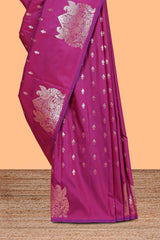 Magenta colour Semi soft silk withgold zari floral motifs border with Peacock Woven Design and matching blouse