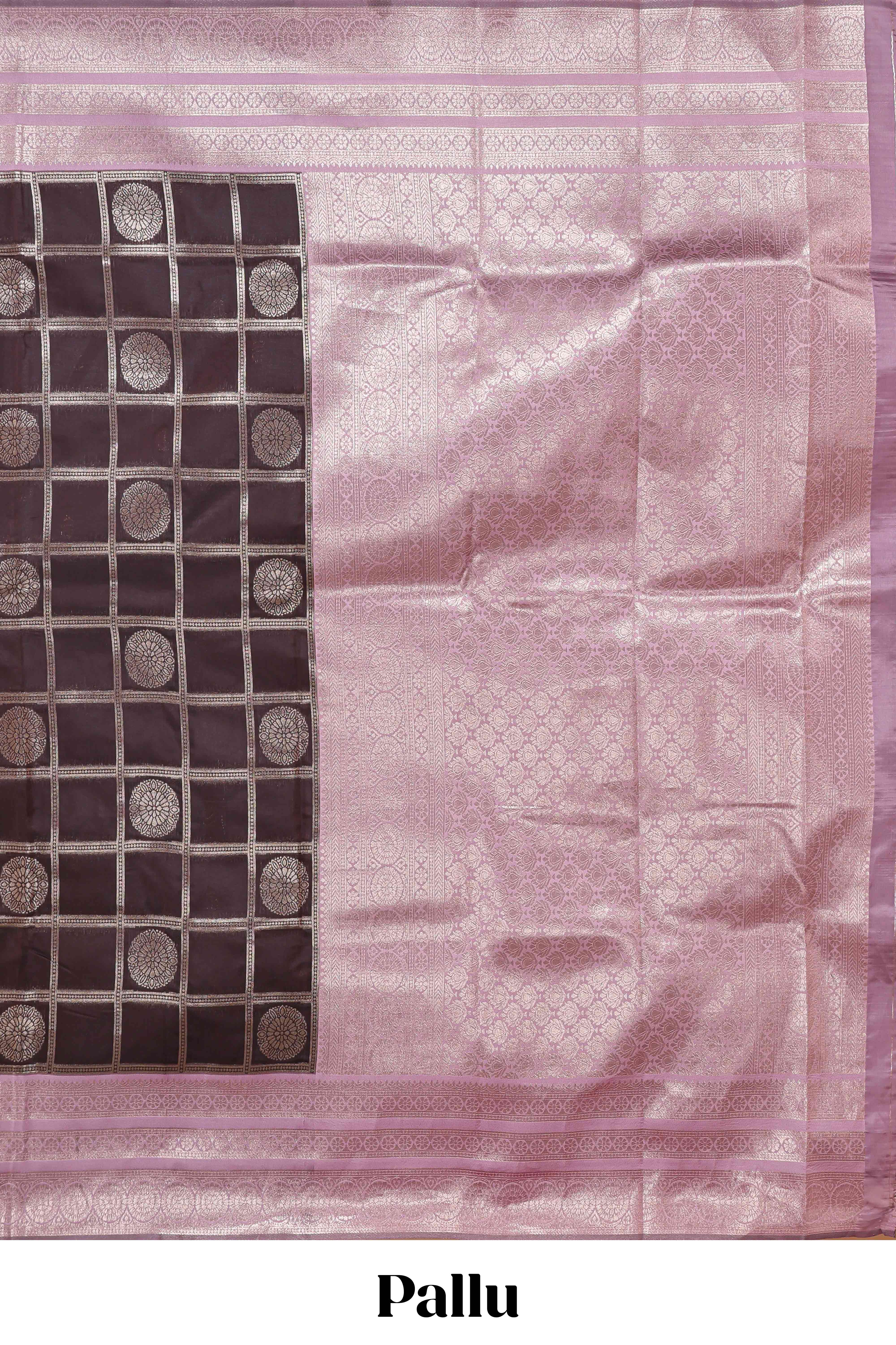 Dark brown checked floral motifs design semi soft silk saree with contrast border and blouse