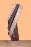 Dark brown checked floral motifs design semi soft silk saree with contrast border and blouse