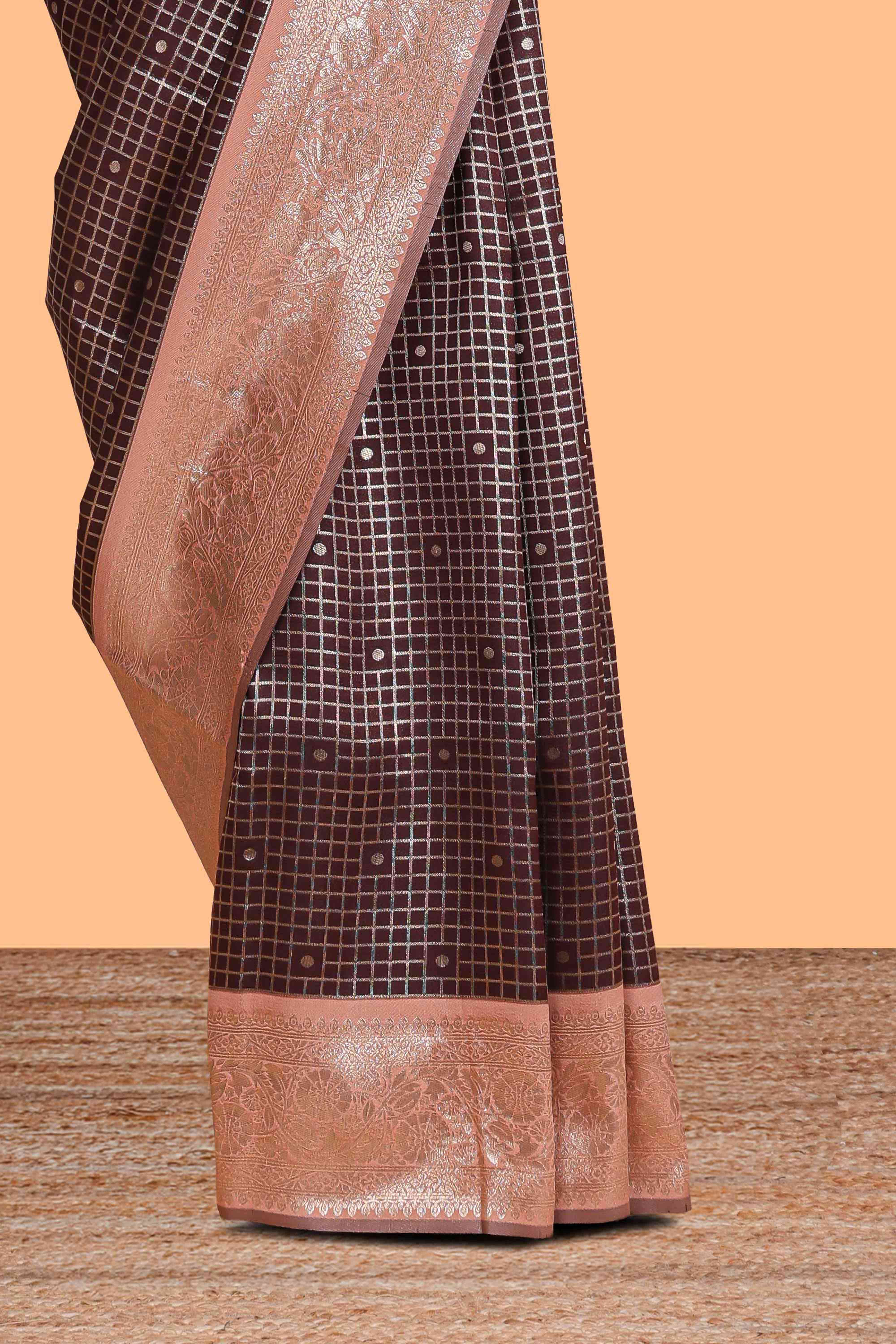 Dark brown checked floral motifs design semi soft silk saree with contrast border and blouse
