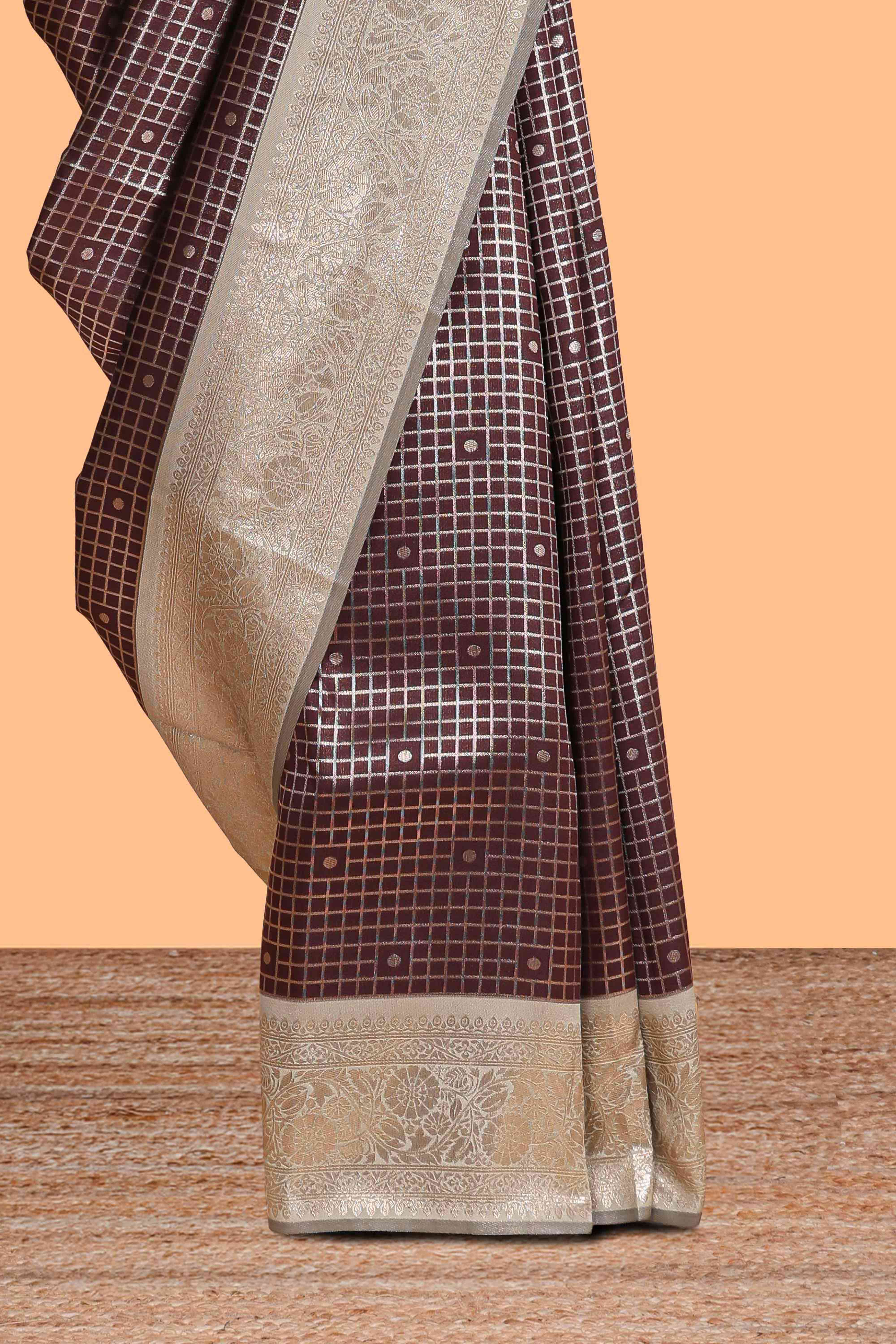 Dark brown checked floral motifs design semi soft silk saree with contrast border and blouse