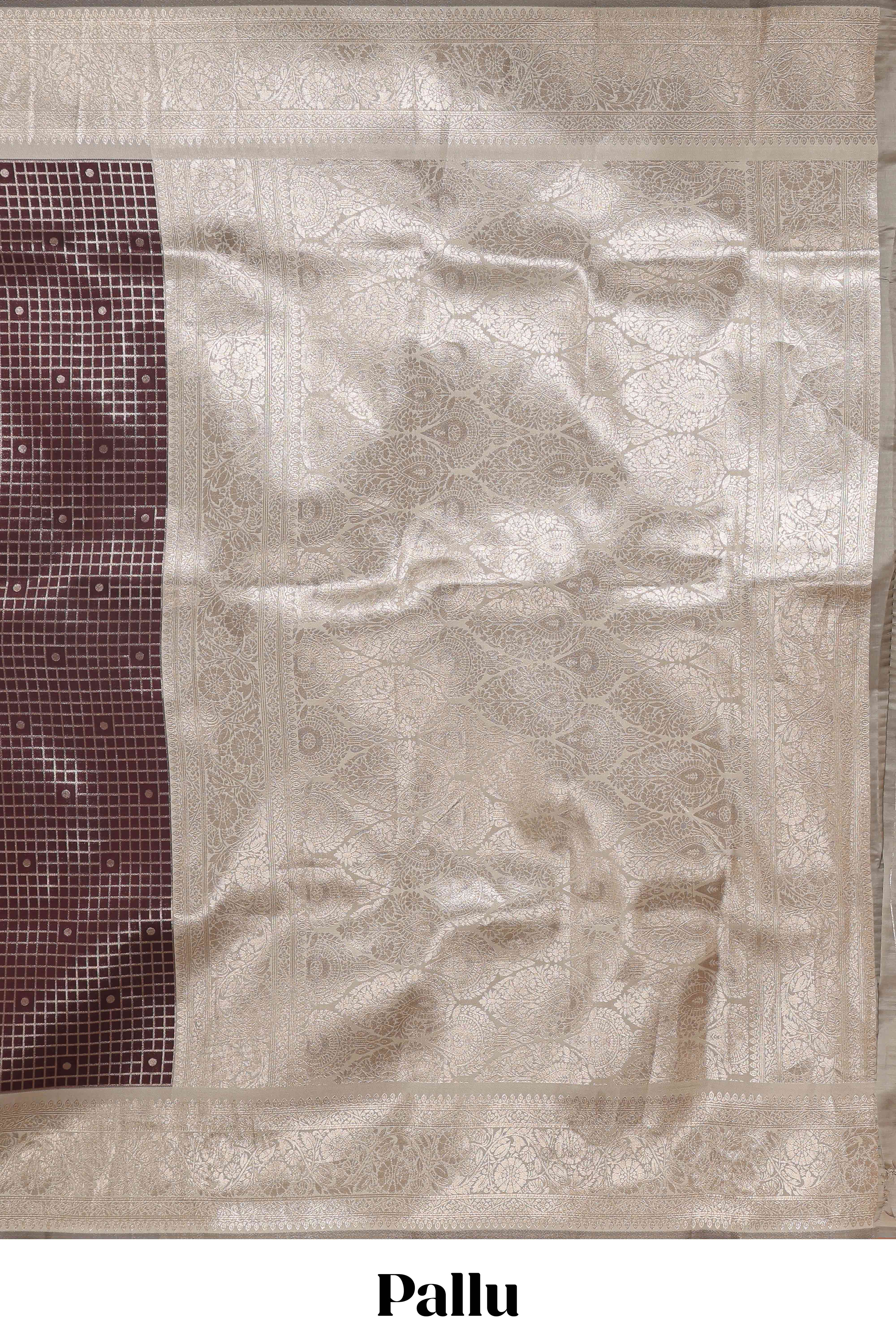 Dark brown checked floral motifs design semi soft silk saree with contrast border and blouse