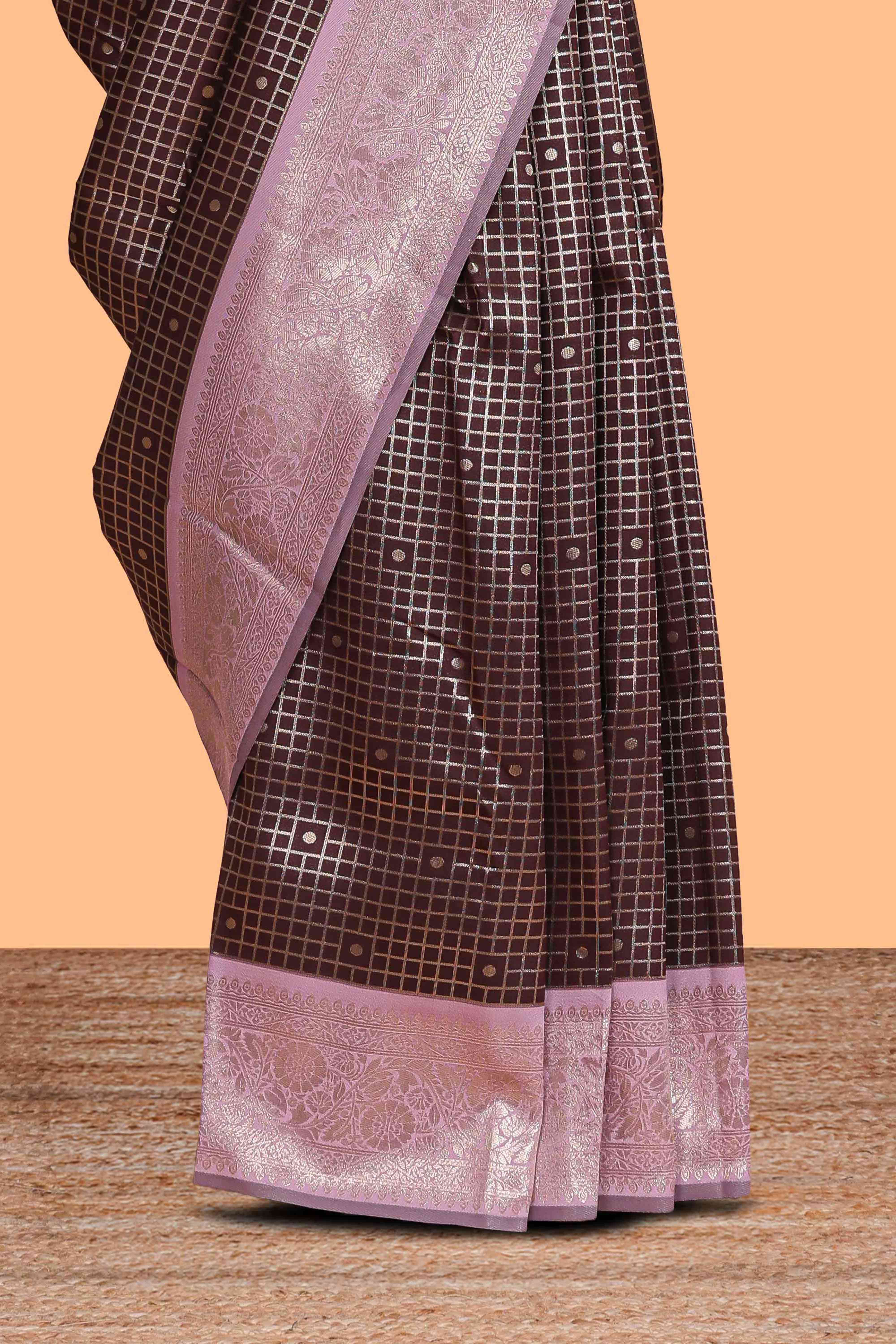 Dark brown checked floral motifs design semi soft silk saree with contrast border and blouse