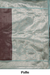Dark brown checked floral motifs design semi soft silk saree with contrast border and blouse