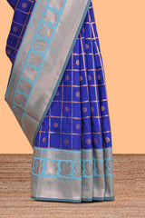 Blue checked floral motifs design semi soft silk saree with contrast border and blouse