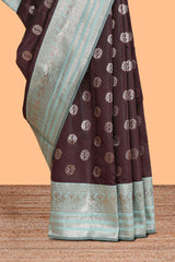 Dark brown zari butta design semi soft silk saree with contrast border and blouse