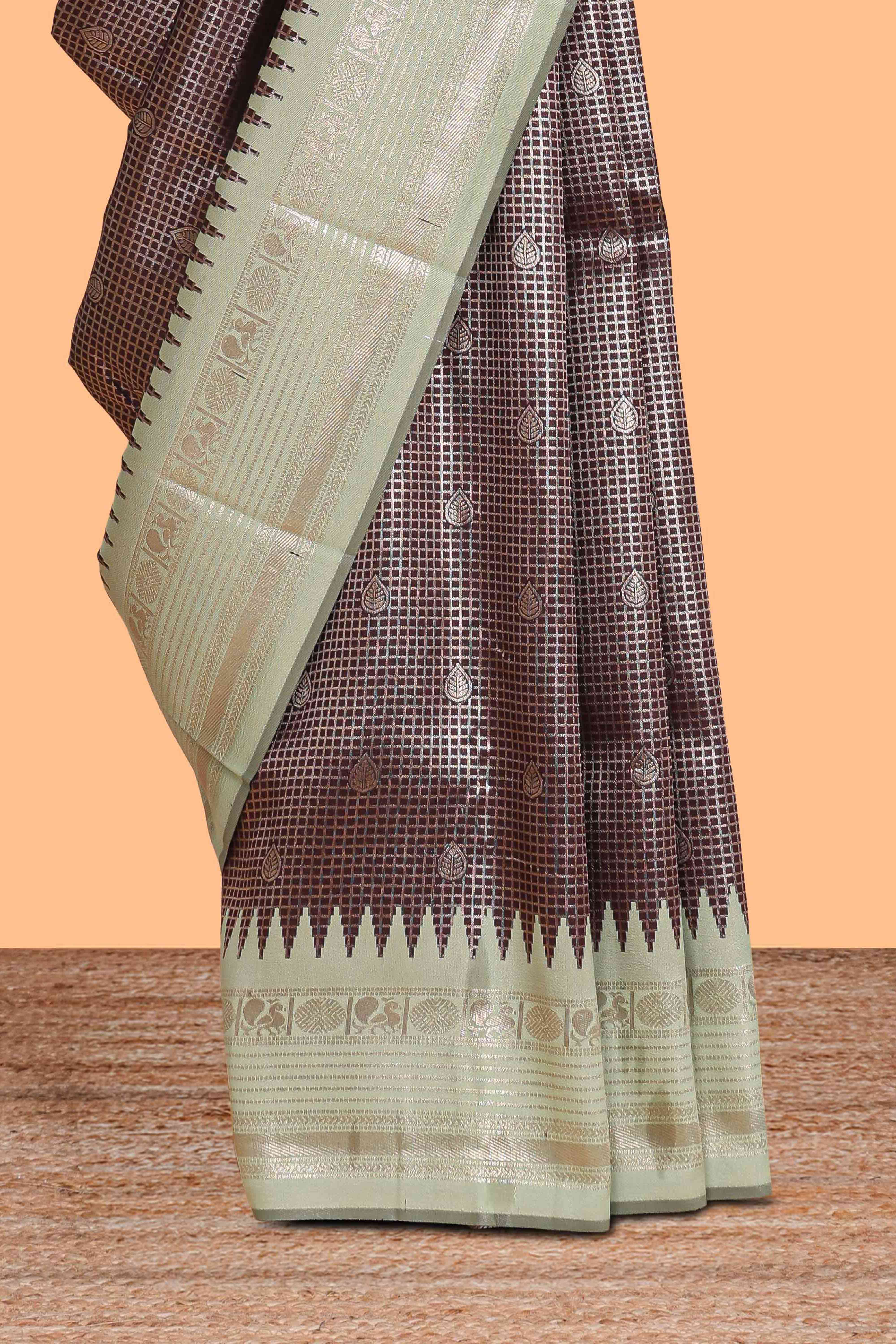 Dark brown zari checked design semi soft silk saree with contrast border and blouse