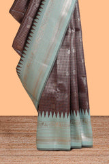 Dark brown zari checked design semi soft silk saree with contrast border and blouse