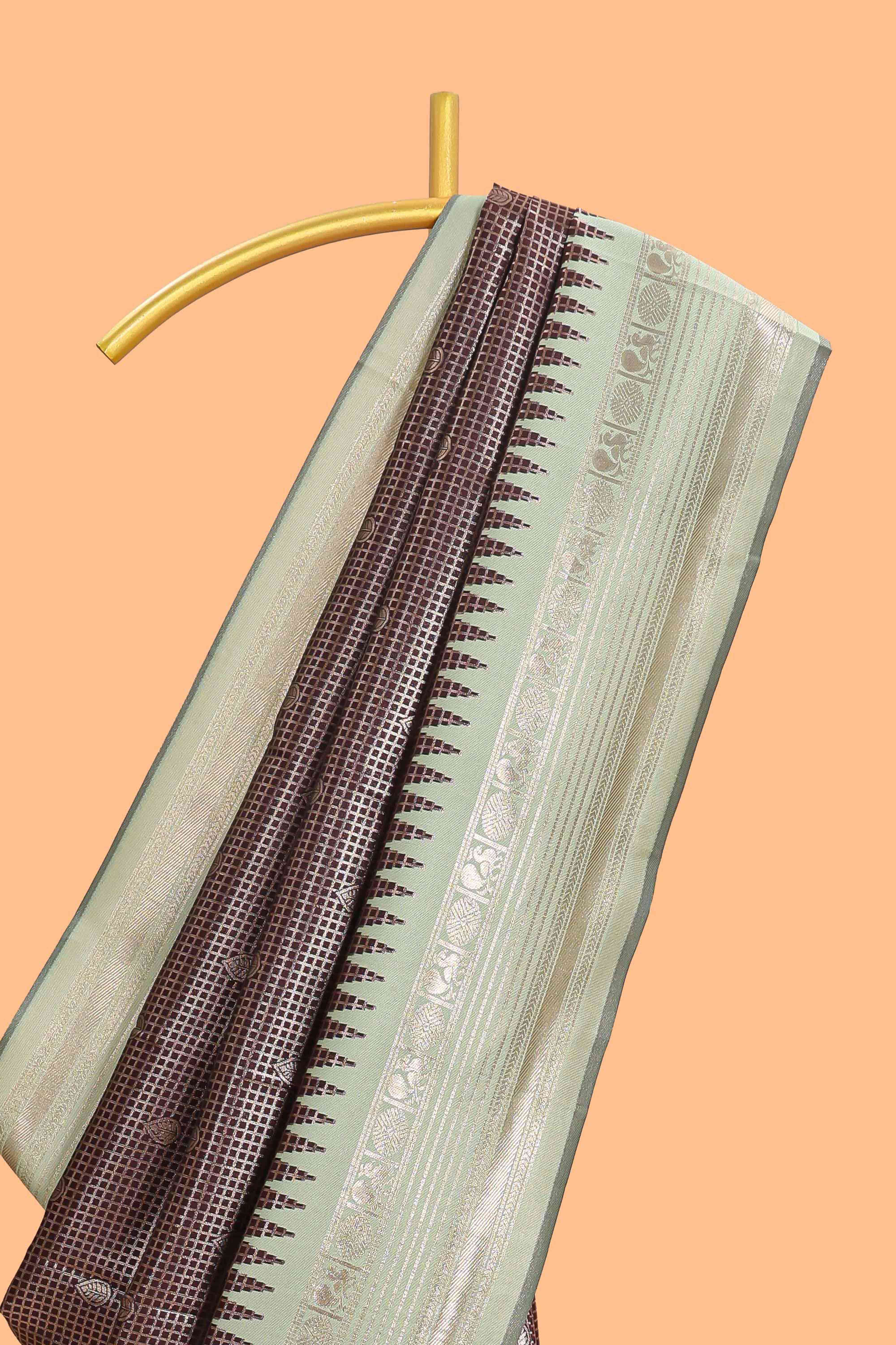 Dark brown zari checked design semi soft silk saree with contrast border and blouse