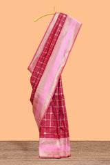 Maroon checked floral zari design semi soft silk saree with contrast bentex border and floral motifs blouse