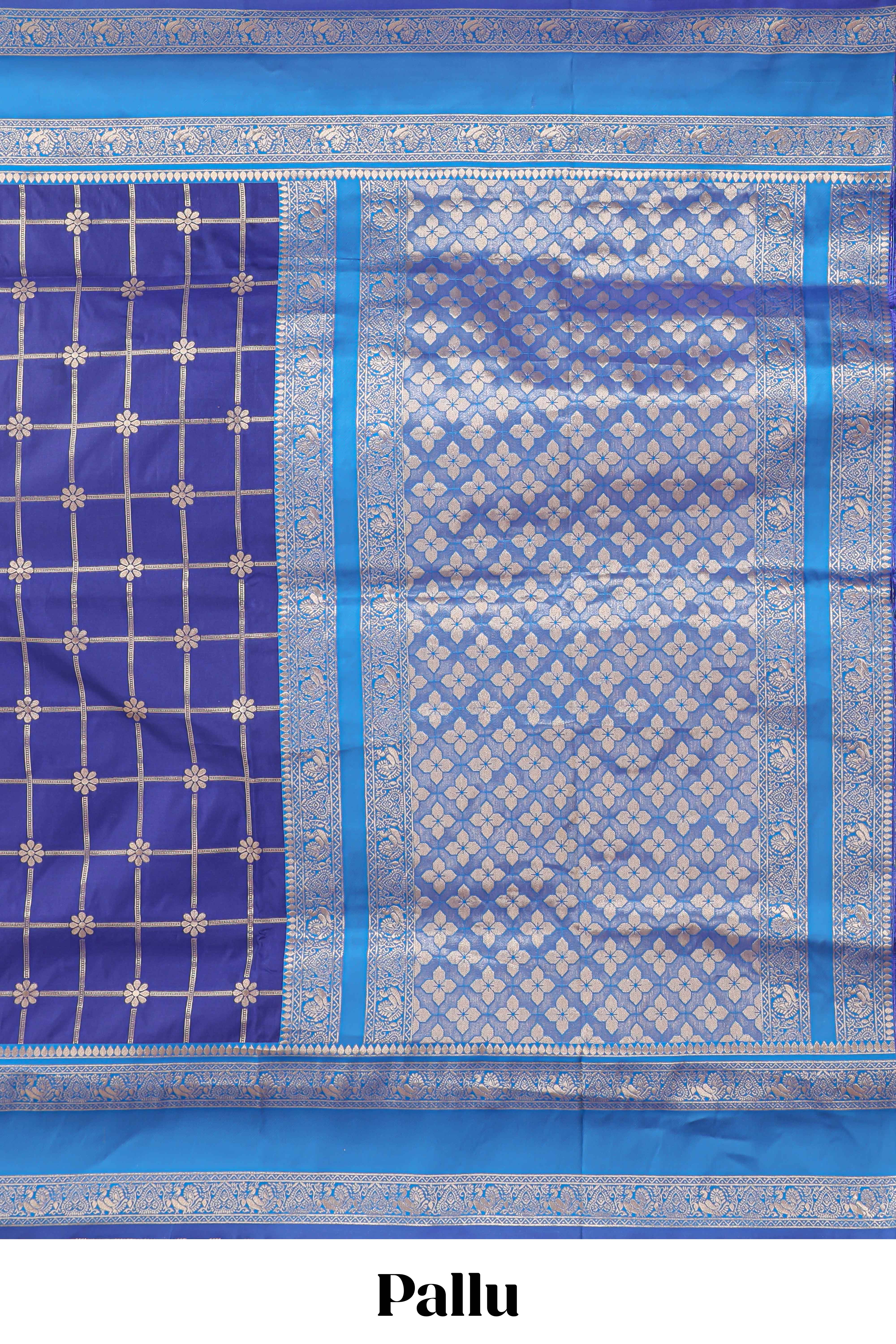 Blue checked floral zari design semi soft silk saree with contrast bentex border and floral motifs blouse
